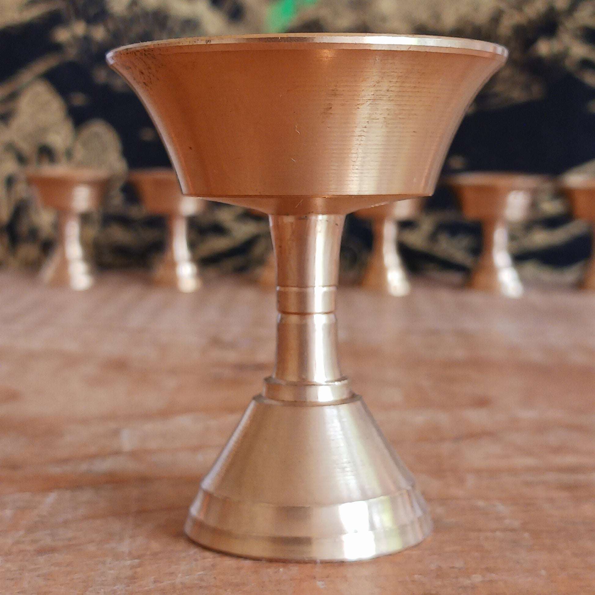 Bring sacred Tibetan tradition into your space with this handcrafted Brass Butter Lamp, a timeless symbol of wisdom and spiritual illumination. Commonly found in Tibetan Buddhist temples and monasteries across the Himalayas, butter lamps are offered each morning to dispel darkness and invite enlightenment.