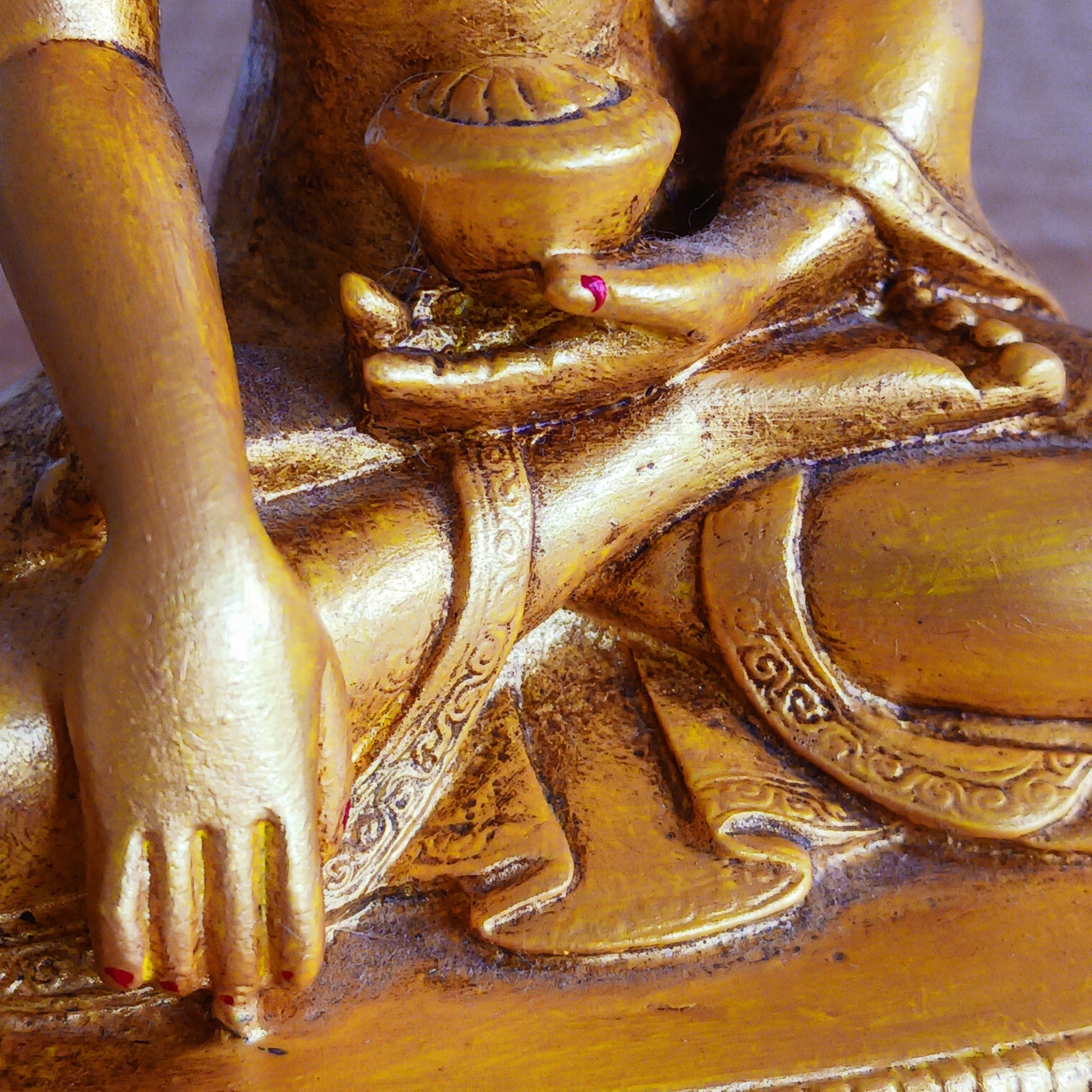 Bring serenity and spiritual elegance into your space with this stunning Shakyamuni Buddha statue. Crafted from durable clay and resin, it is meticulously painted in rich gold and traditional thangka colours, following the authentic colour patterns described in ancient texts.