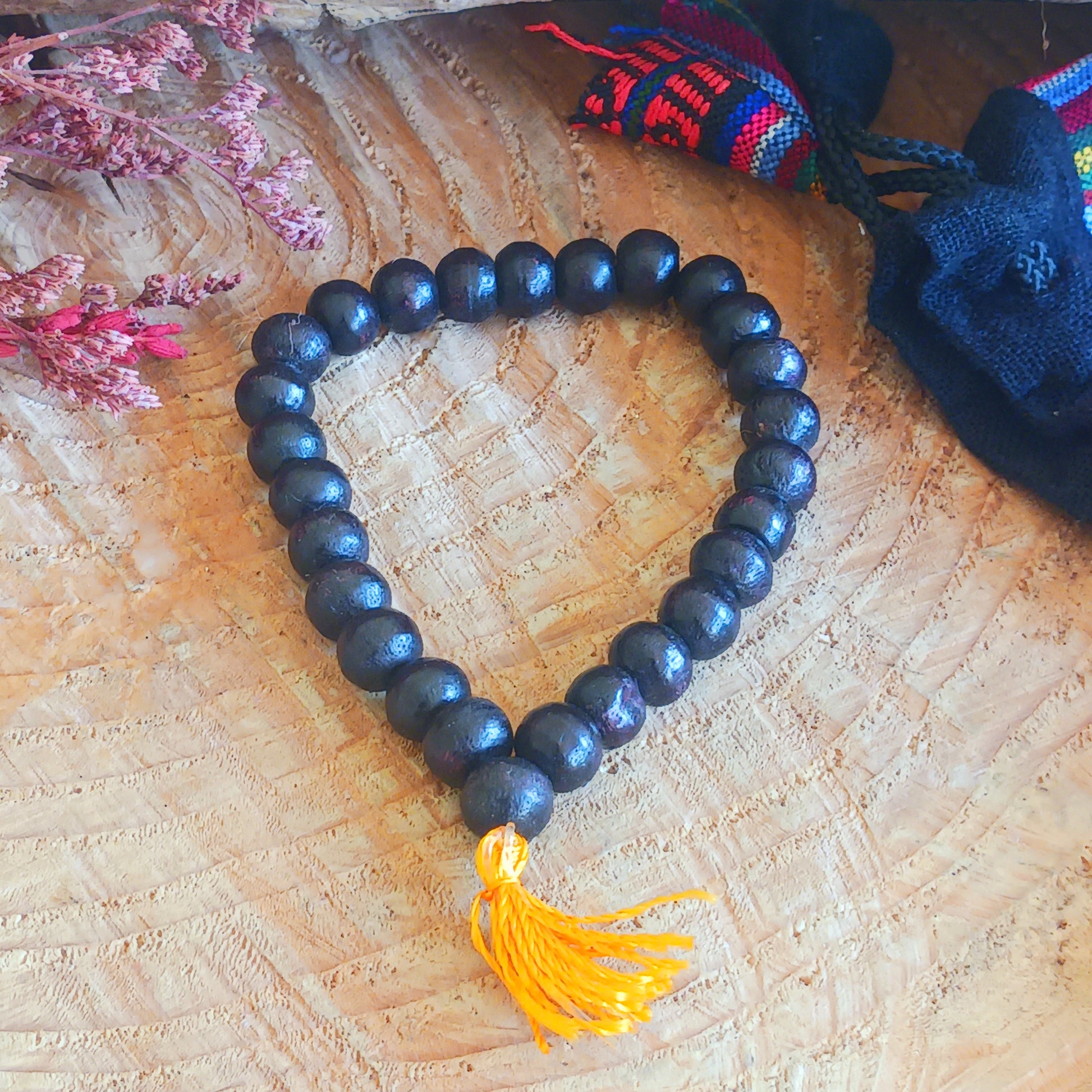 Carry a meaningful symbol of mindfulness wherever you go with this beautifully crafted Buddhist Mala Bracelet. Strung on a durable elasticated cord for a comfortable fit, this traditional wrist mala features 27 beads, representing a quarter of the sacred 108-bead mala commonly used in Buddhist meditation and prayer practices.