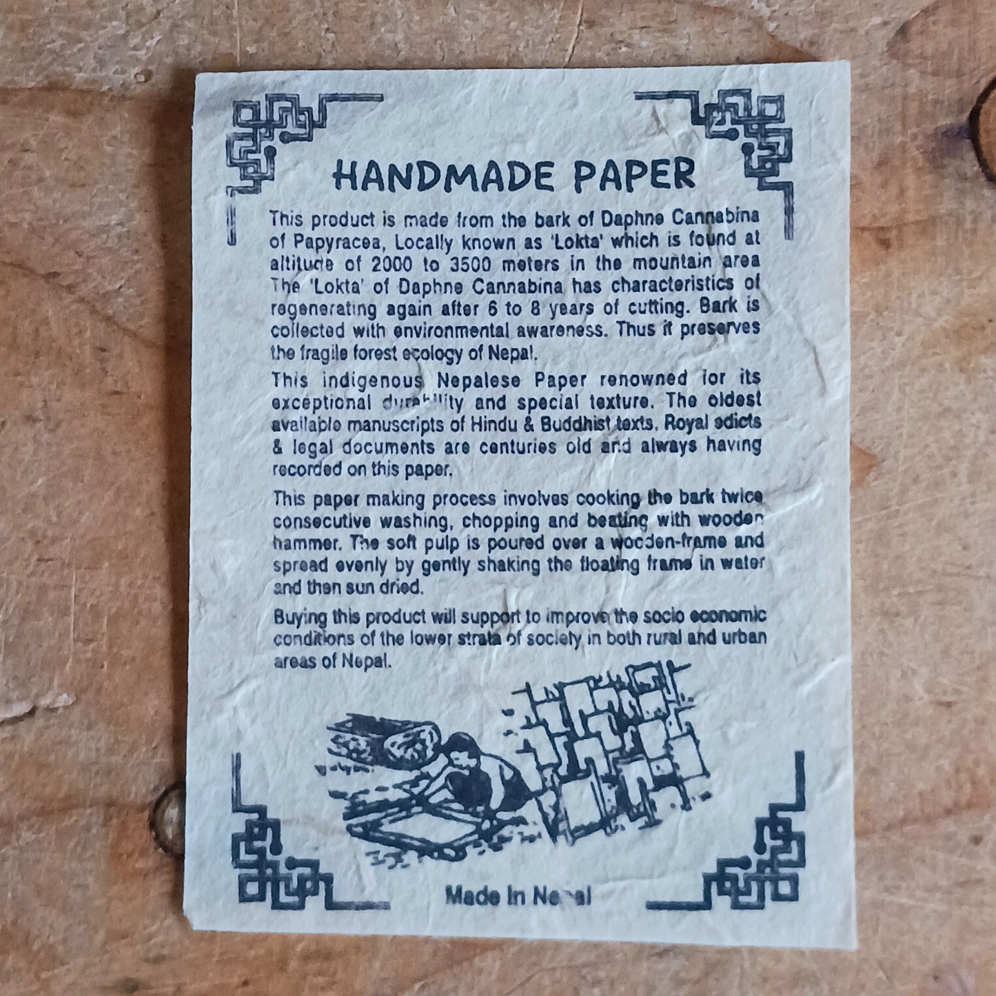 Experience the beauty of traditional Nepalese craftsmanship with this Buddha | Wisdom Eyes Notebook, handcrafted from natural Lokta paper. Each notebook features a durable hardback cover and approximately 50 pages of acid-free, eco-friendly Lokta paper, making it perfect for writing, sketching, journaling, or preserving important scripts for long periods.