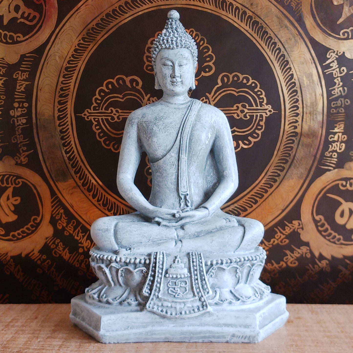 Invite peace and mindfulness into your space with this serene grey Thai-style Buddha statue. Crafted to reflect traditional Thai artistry, this elegant piece features a meditating Buddha seated gracefully on a throne. The calm expression and intricate detailing make it a perfect centerpiece for your home, meditation area, or spiritual altar. Ideal for anyone seeking a touch of tranquility and spiritual inspiration in their décor.