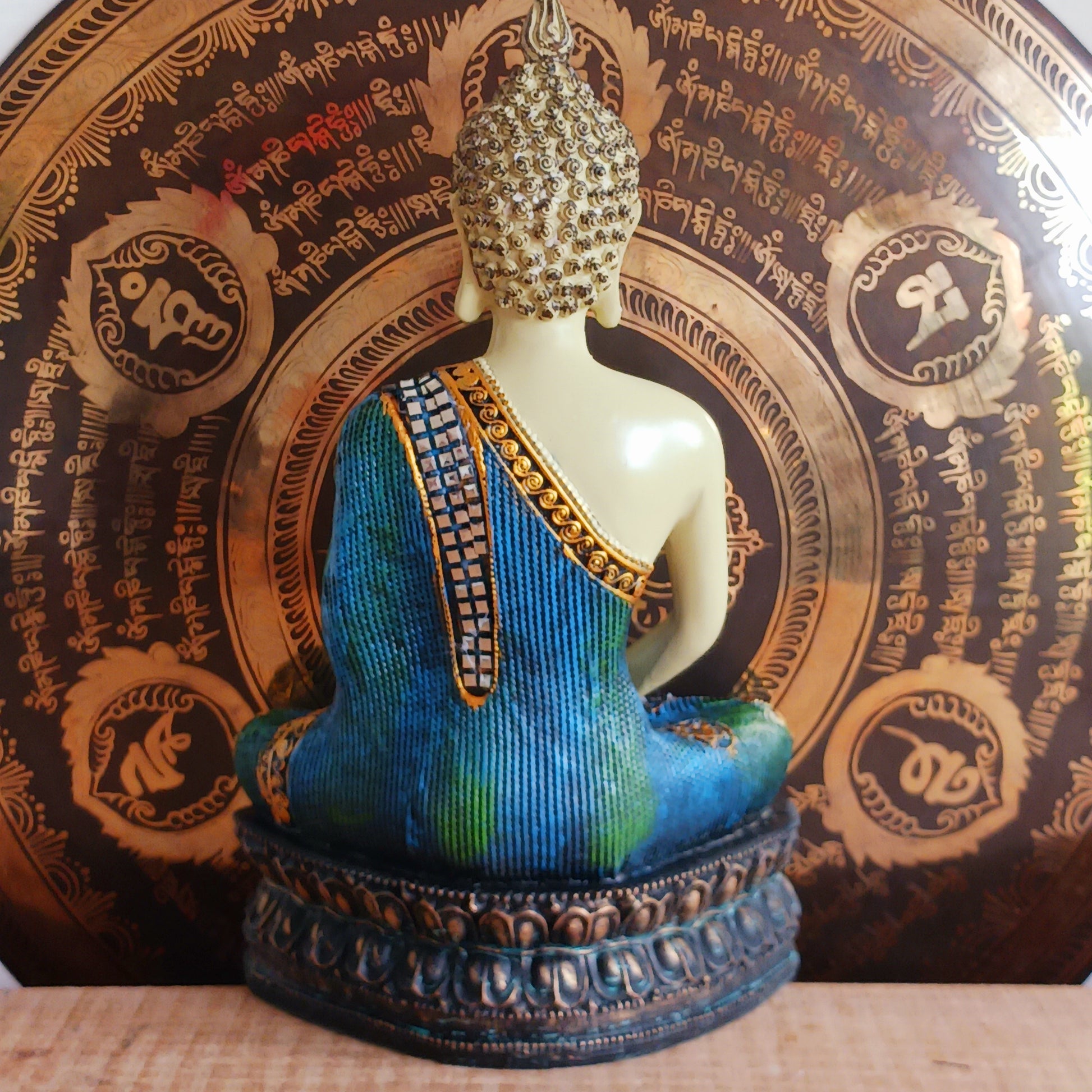 Bring serenity and elegance to your space with this meditating Thai-Style Buddha statue. Standing 29 cm tall, it is beautifully crafted from durable Poly Resin and features a shimmering Mirror inlay that reflects light and grace in every detail. Perfect for home decor, meditation spaces, or as a meaningful gift, this statue inspires peace and mindfulness wherever it's placed.