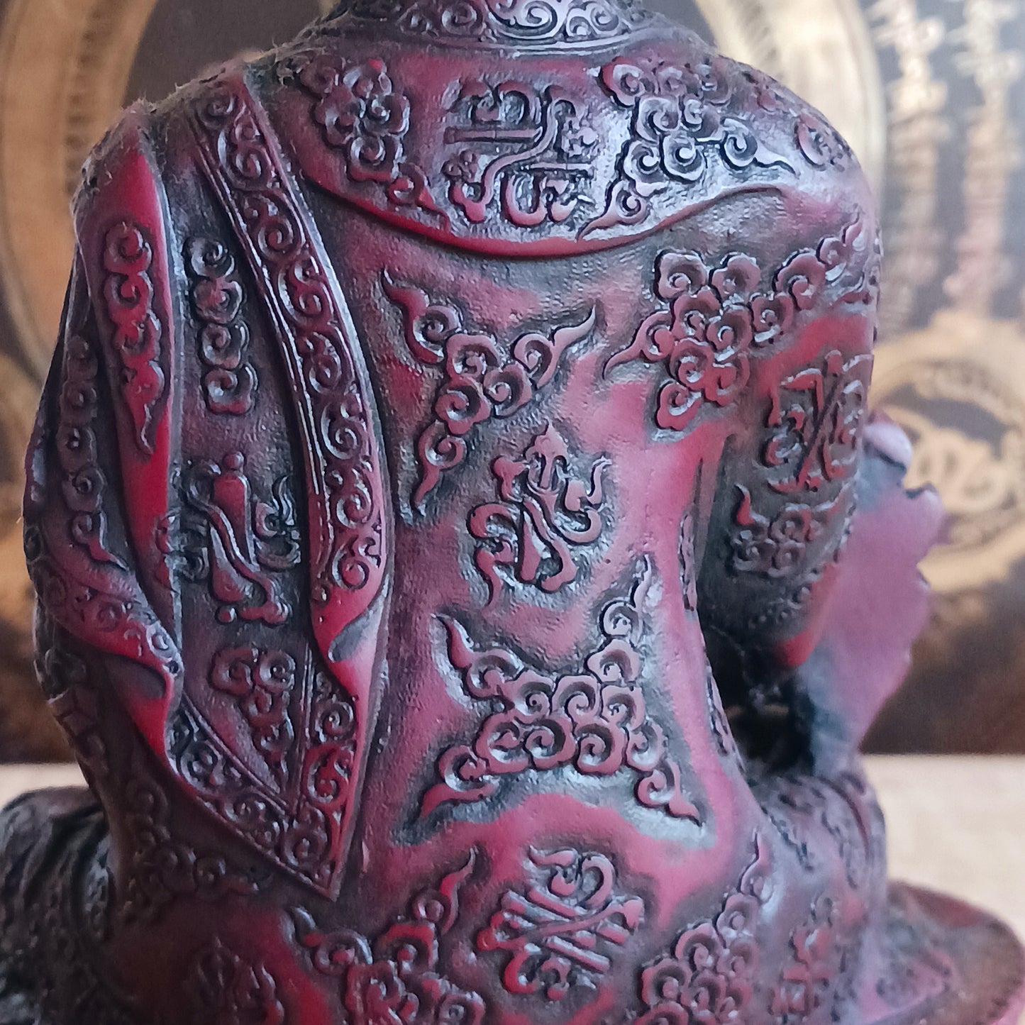 Bring the serene power of healing into your space with this large Medicine Buddha statue. Crafted in a deep, rich red colour with intricate detailing, this sculpture represents Bhaisajya Tathagatta, also known as the Healing Buddha.