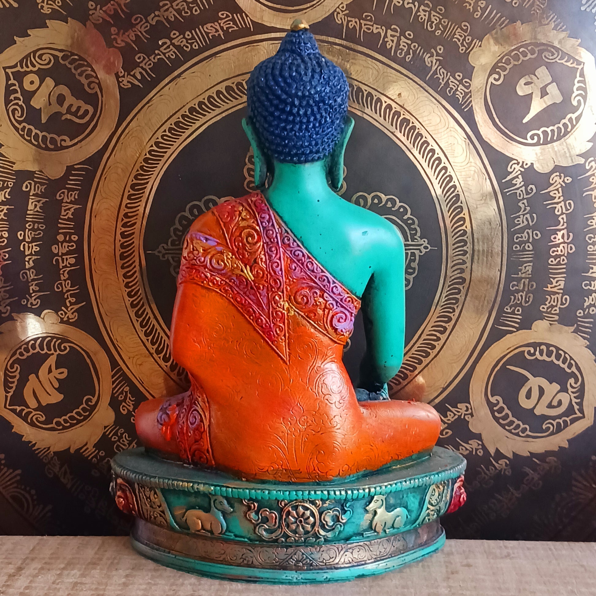 This exquisite large statue of Shakyamuni Buddha has been meticulously hand-painted using traditional thangka colours, preserving an ancient artistic lineage. Each brushstroke reflects the time-honoured process of colouring sacred imagery exactly as described in classical Buddhist teachings.