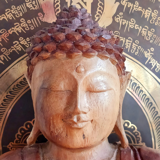 Bring a sense of peace, serenity and mindfulness into your home with this beautiful large Hand Carved Wooden Meditating Buddha Statue. Traditionally crafted in Bali from sustainable Suar wood, each statue is a unique work of art, showcasing the natural beauty of the wood and the skill of the artisan.