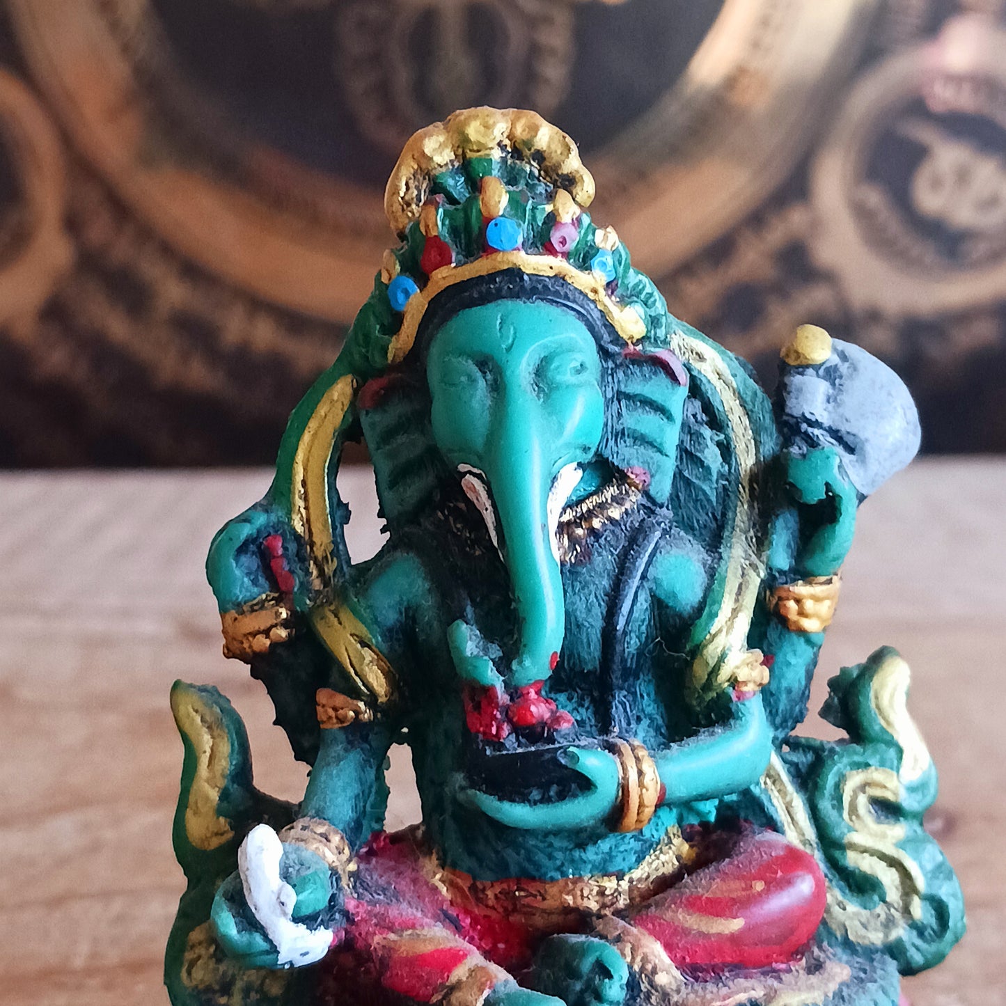 Bring the wisdom and prosperity of Lord Ganesh into your home with this intricately hand-painted resin figurine. Known as the remover of obstacles and the patron of arts and sciences, Ganesh is celebrated for his intellect, wisdom, and guidance.
