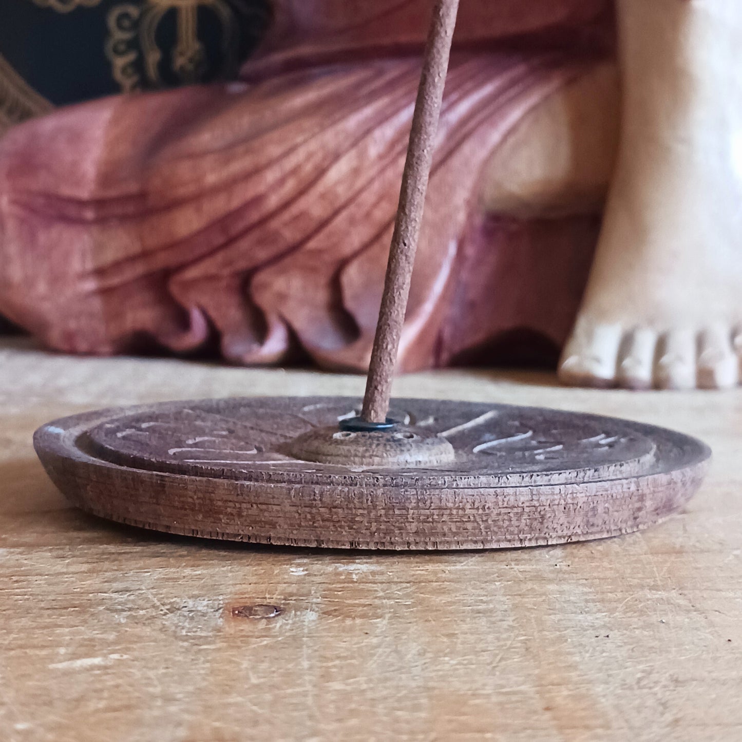 Bring a touch of serenity and spiritual elegance to your space with this handmade dark wood incense holder. Carefully carved by skilled artisans in Nepal, each holder features intricate OM symbols, representing peace, harmony, and mindfulness.