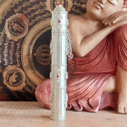 Introducing the Tibetan Buddha Incense Holder, a beautifully handcrafted ritual accessory designed to enhance meditation, prayer, and spiritual practice. This elegant silver-coloured incense holder combines traditional craftsmanship with sacred Buddhist symbolism, creating a meaningful addition to any altar or meditation space.