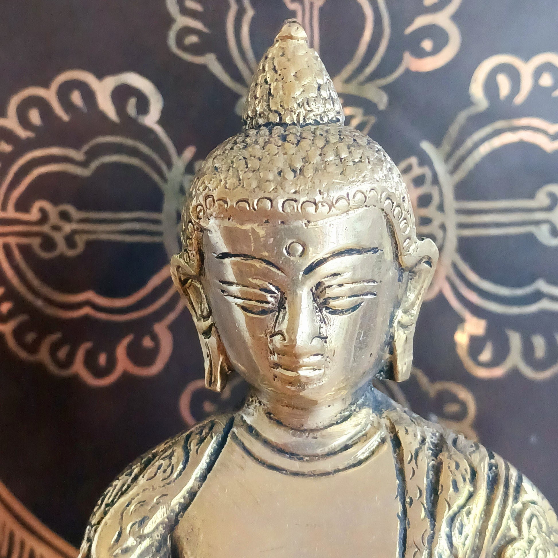Elevate your spiritual space with this exquisite Akshobya Buddha statue, expertly cast in heavy brass and engraved with intricate detail. Representing one of the five Dhyani Buddhas, Akshobya is visualized in blue and associated with the heart chakra, symbolizing the transformation of anger and sadness into love and compassion.