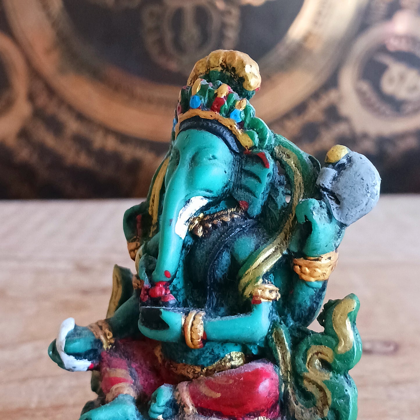 Bring the wisdom and prosperity of Lord Ganesh into your home with this intricately hand-painted resin figurine. Known as the remover of obstacles and the patron of arts and sciences, Ganesh is celebrated for his intellect, wisdom, and guidance.