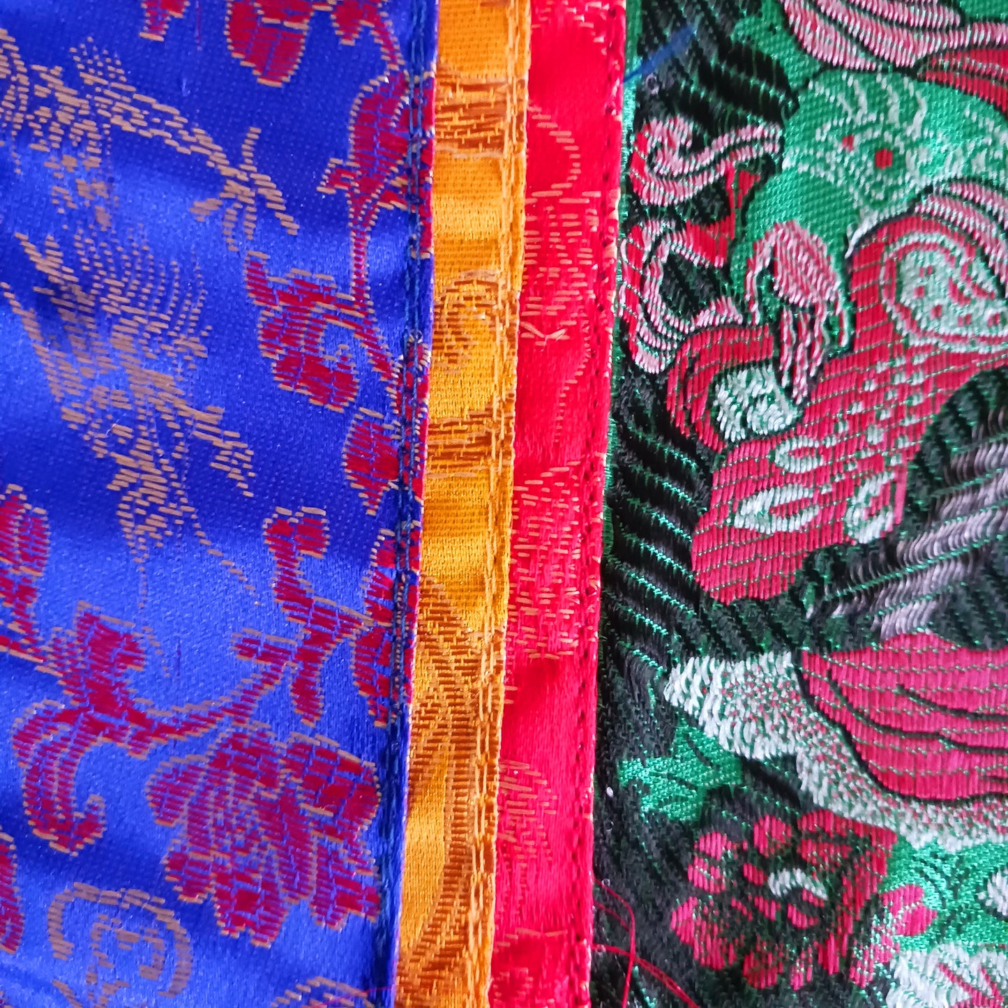 Bring serenity, beauty, and spiritual inspiration into any space with this Handmade Embroidered Green Tara Thangka, crafted by skilled artisans in Nepal. Each piece is created using traditional techniques passed down through generations, featuring intricate embroidery and a rich brocade border that highlights the calm and compassionate presence of Green Tara.