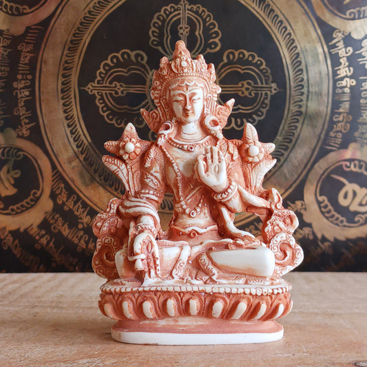 White Tara is known for compassion, long life, healing and serenity and is shown here with her right hand in the varada mudra (blessing pose.) White Tara is distinct from the more commonly seen Green Tara. She is seated in a tranquil, full lotus position as opposed to Green Tara's one foot extended pose. 