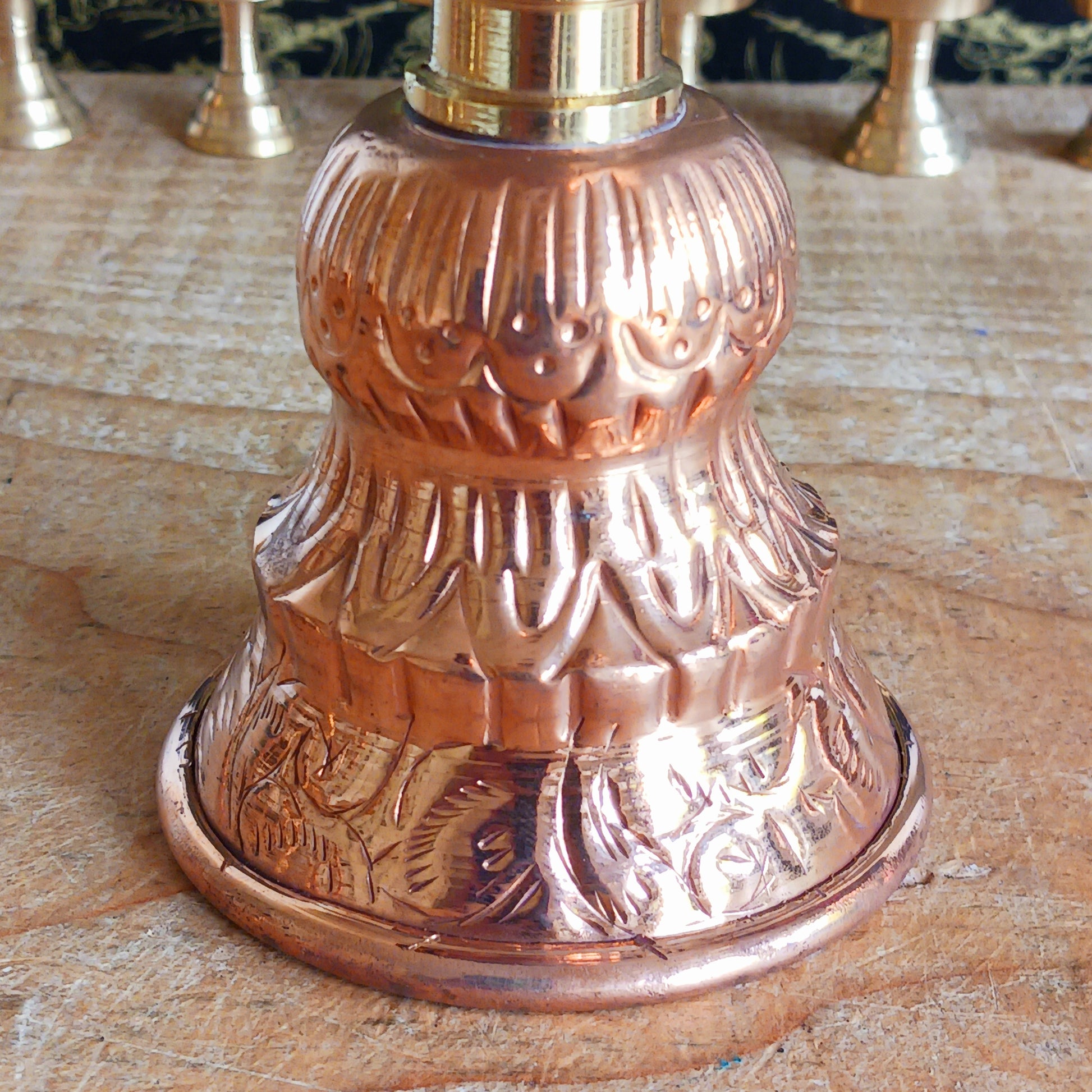 Illuminate your spiritual practice with this fine Traditional Tibetan Butter Lamp, handcrafted from high-quality copper and adorned with intricate Auspicious Symbols. These sacred lamps are a central element in Tibetan Buddhist rituals, symbolizing the light of wisdom dispelling the darkness of ignorance. Commonly found in Himalayan temples and monasteries, butter lamps are offered each morning by Tibetan Buddhists.