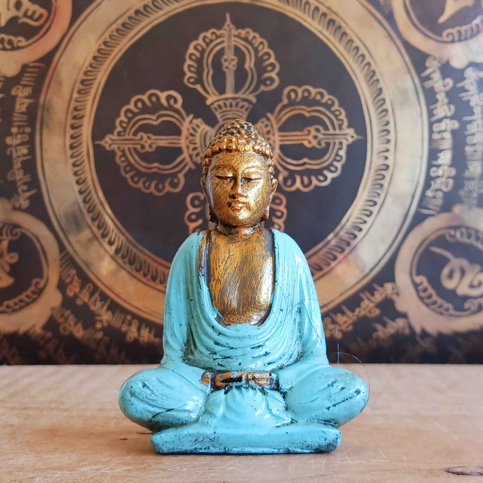 Create a calming and uplifting atmosphere with this beautiful little Turquoise & Gold Buddha Statue. Designed to inspire peace, harmony, and positive energy, this charming decorative ornament makes a wonderful addition to any home, office, meditation room, or yoga space.