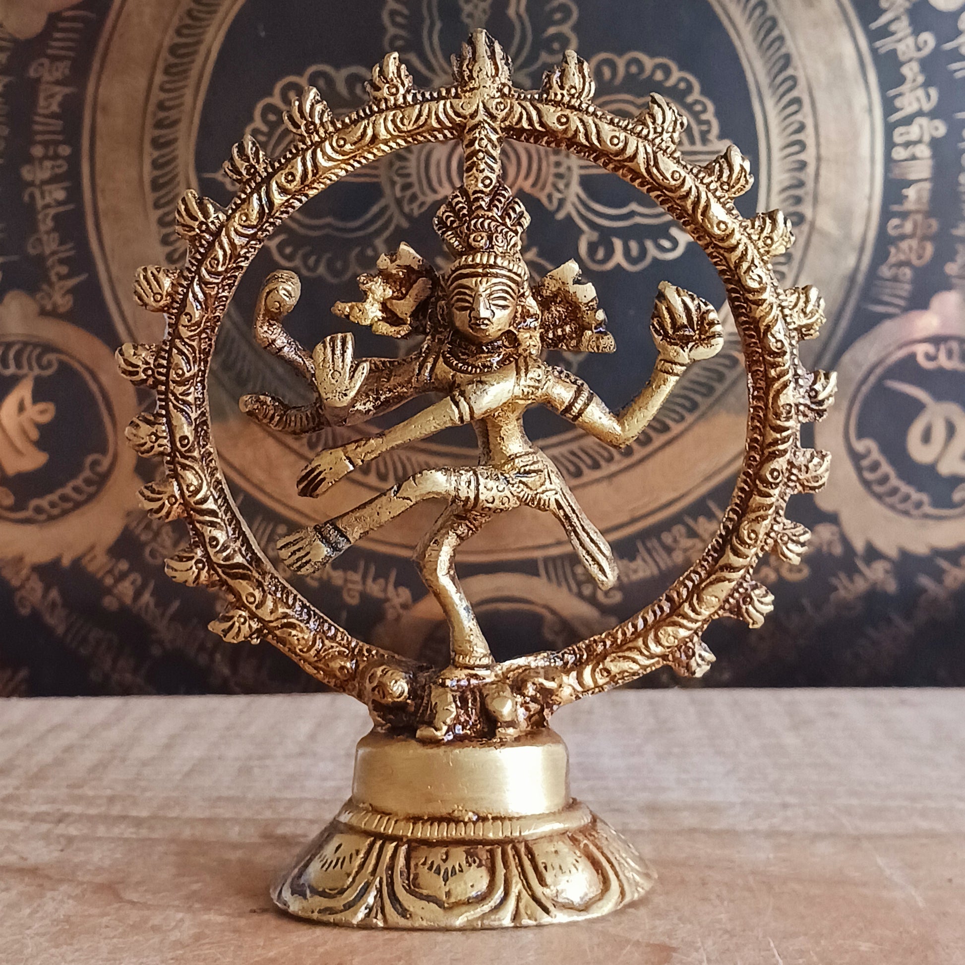 Invite balance, protection, and divine energy into your space with this beautifully crafted Brass Shiva Nataraja Statue. Cast in solid brass, this small yet striking sculpture captures Shiva in his cosmic dance—Nataraja, the King of Dance—symbolizing the ever-moving universe and the eternal cycle of creation, destruction, and renewal.