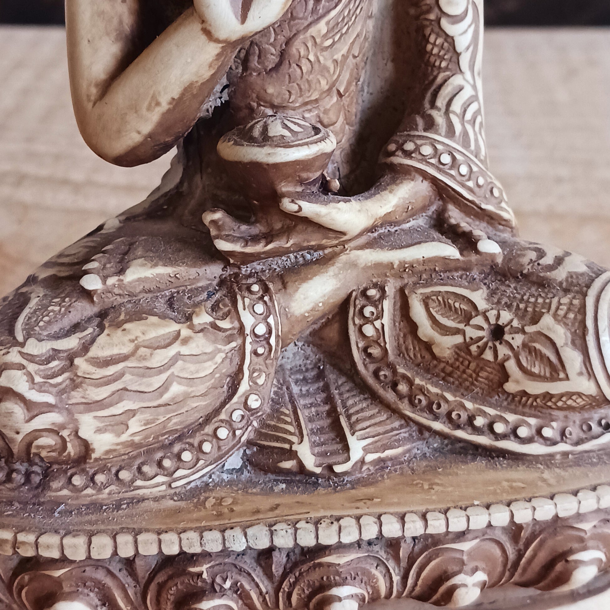 Bring serenity and protection into your space with this exquisite Buddha Amogasiddhi statue. Handcrafted with intricate detailing, this statue represents one of the Five Dhyani Buddhas, embodying the Wisdom of Unfailing Accomplishment.