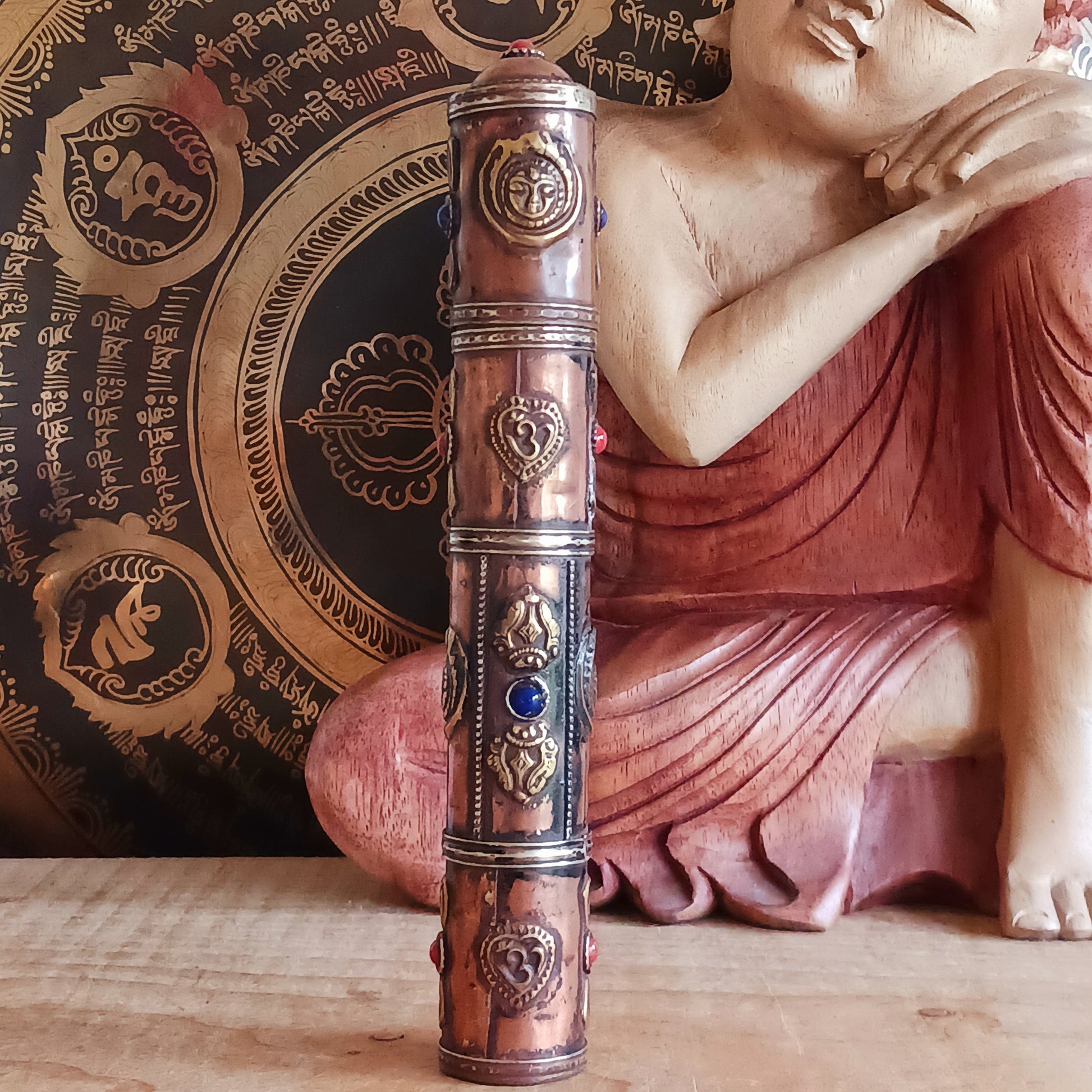 Introducing the Dorje Tibetan Incense Holder, a meticulously handcrafted ritual accessory designed to elevate your incense experience. This exquisite incense holder is not only a functional storage solution but also a captivating piece of art. Carefully crafted and adorned with brass dorjes and auspicious symbols, it exudes a sense of spiritual elegance.