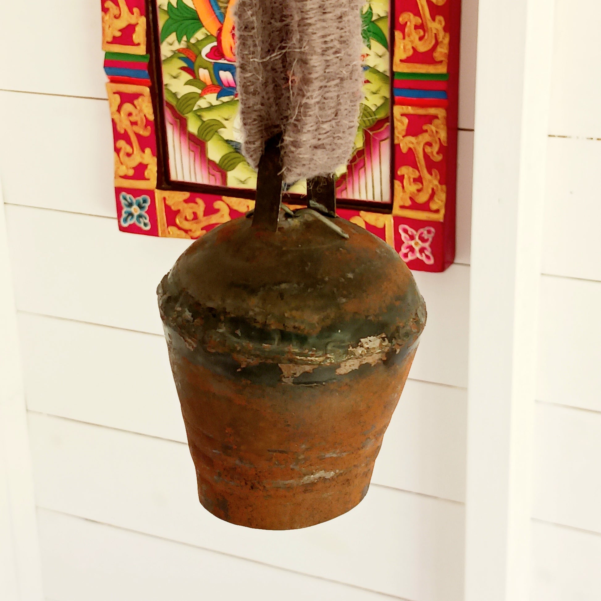 Bring the authentic charm of the Himalayas into your home with this handcrafted Nepalese Yak Bell. Traditionally used by yak herders in Nepal and Tibet, these distinctive bells were hung around the necks of yaks to help locate animals grazing across mountainous landscapes.
