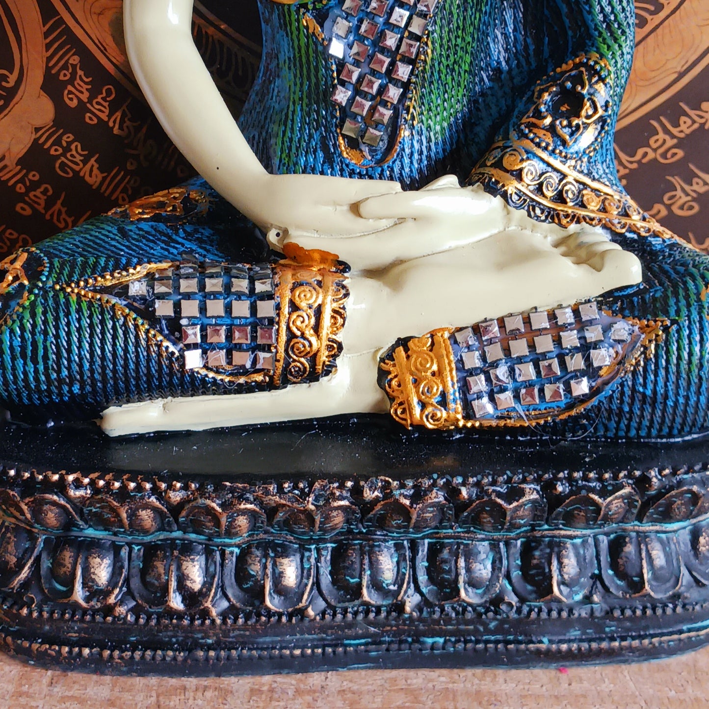 Bring serenity and elegance to your space with this meditating Thai-Style Buddha statue. Standing 29 cm tall, it is beautifully crafted from durable Poly Resin and features a shimmering Mirror inlay that reflects light and grace in every detail. Perfect for home decor, meditation spaces, or as a meaningful gift, this statue inspires peace and mindfulness wherever it's placed.