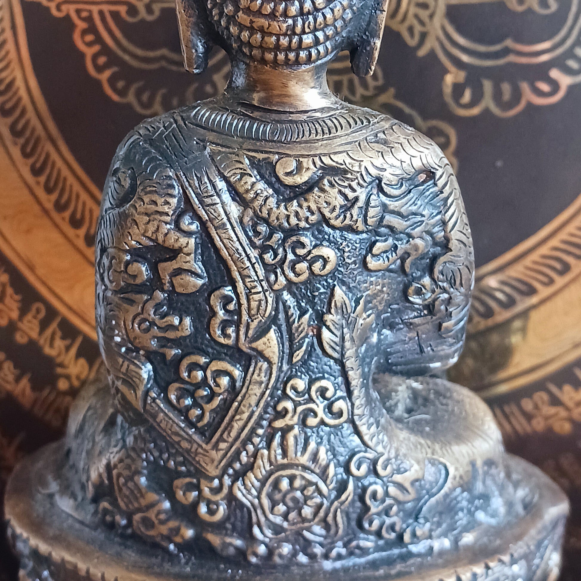 Elevate your spiritual space with this exquisite Akshobya Buddha statue, expertly cast in heavy brass and engraved with intricate detail. Representing one of the five Dhyani Buddhas, Akshobya is visualized in blue and associated with the heart chakra, symbolizing the transformation of anger and sadness into love and compassion.