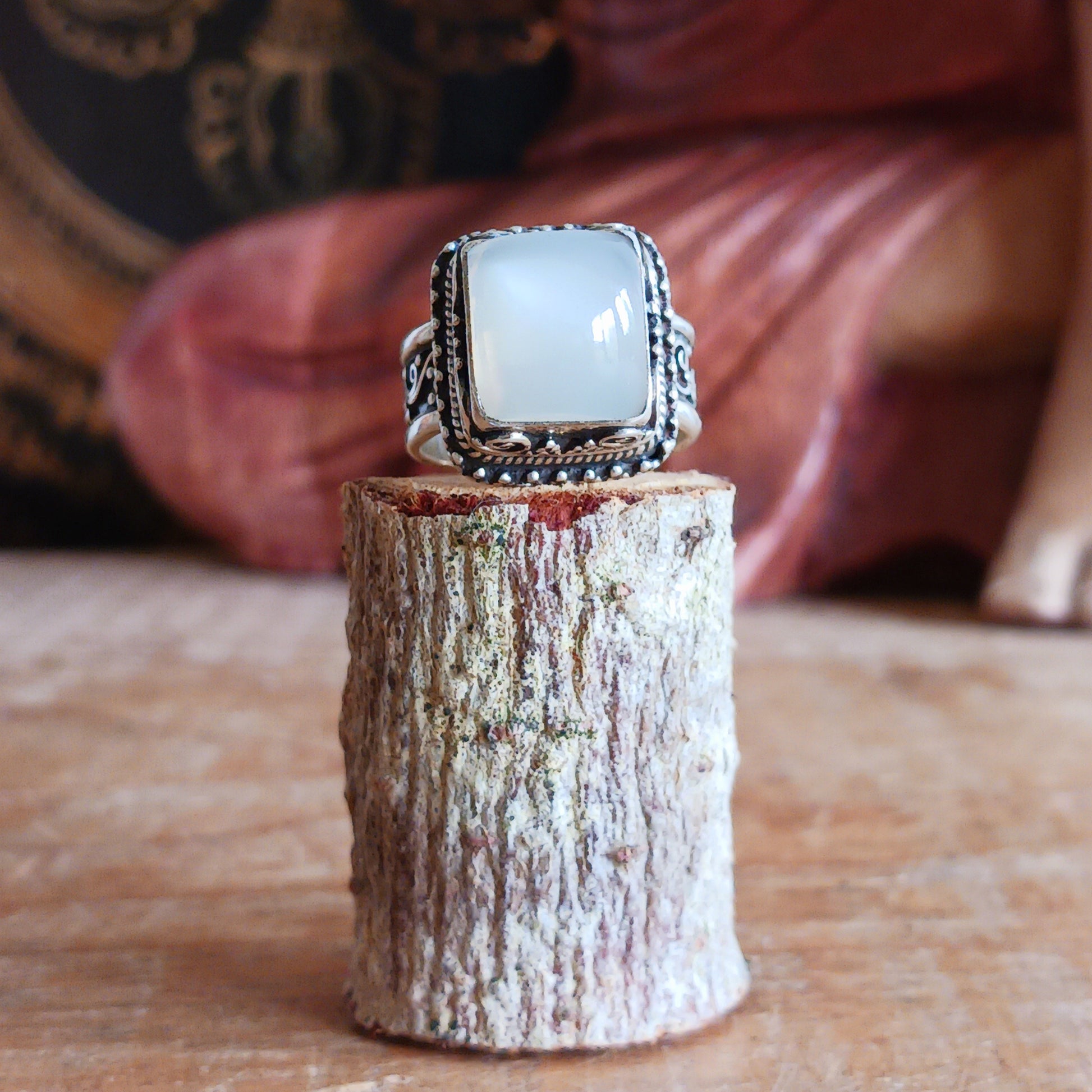 Embrace the beauty and meaning of this exquisite Tibetan Moonstone Ring, expertly handcrafted in 925 sterling silver with an intricate surround design. Each ring showcases the natural glow of moonstone, a gemstone celebrated for its calming energy and timeless elegance.