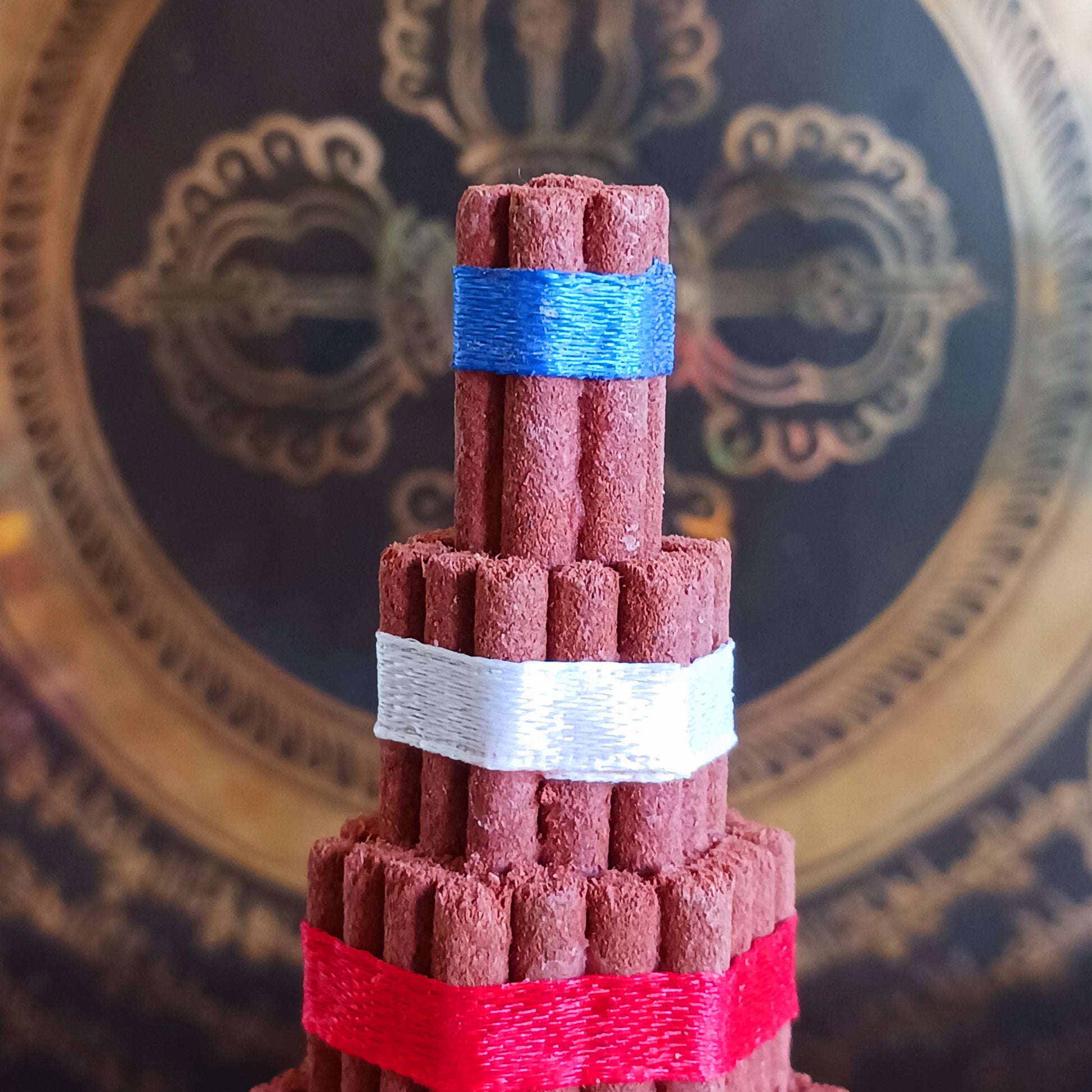 Bring authentic Himalayan tradition to your sacred space with this Buddhist Shrine Tibetan Incense Torma. Handmade in Nepal using the ancient art of incense crafting, each torma is carefully formed from a blend of herbs, fragrant woods, and spices.