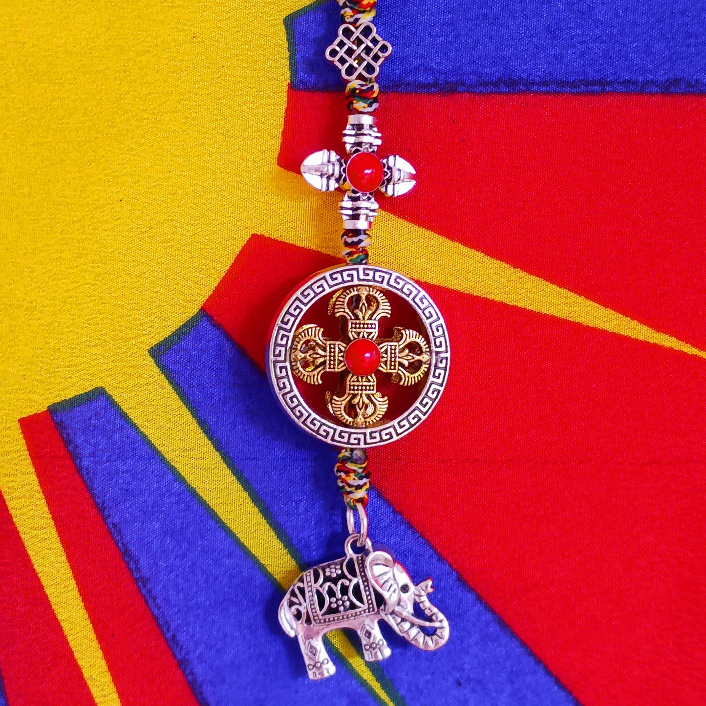 Bring peace, protection, and powerful symbolism wherever you go with this Buddhist protective pendant. Featuring the Double Dorje, a sacred symbol of stability, strength, and protection from fear, and an Elephant, representing the transformation of desire into mindfulness and contentment, this pendant is a meaningful accessory for your car, home, bag, or key ring. Crafted with intention, it's a perfect reminder of your inner strength and spiritual focus.