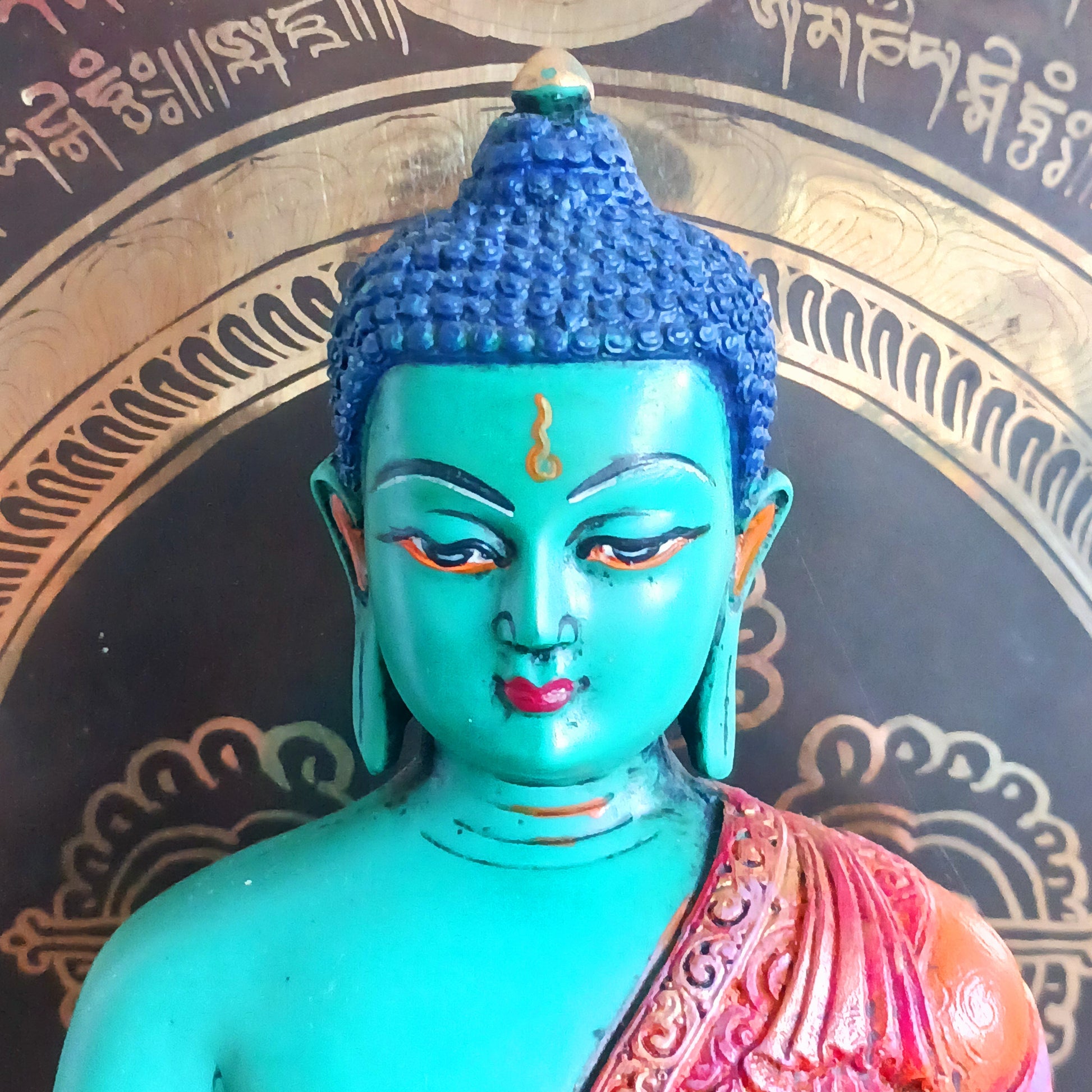 This exquisite large statue of Shakyamuni Buddha has been meticulously hand-painted using traditional thangka colours, preserving an ancient artistic lineage. Each brushstroke reflects the time-honoured process of colouring sacred imagery exactly as described in classical Buddhist teachings.