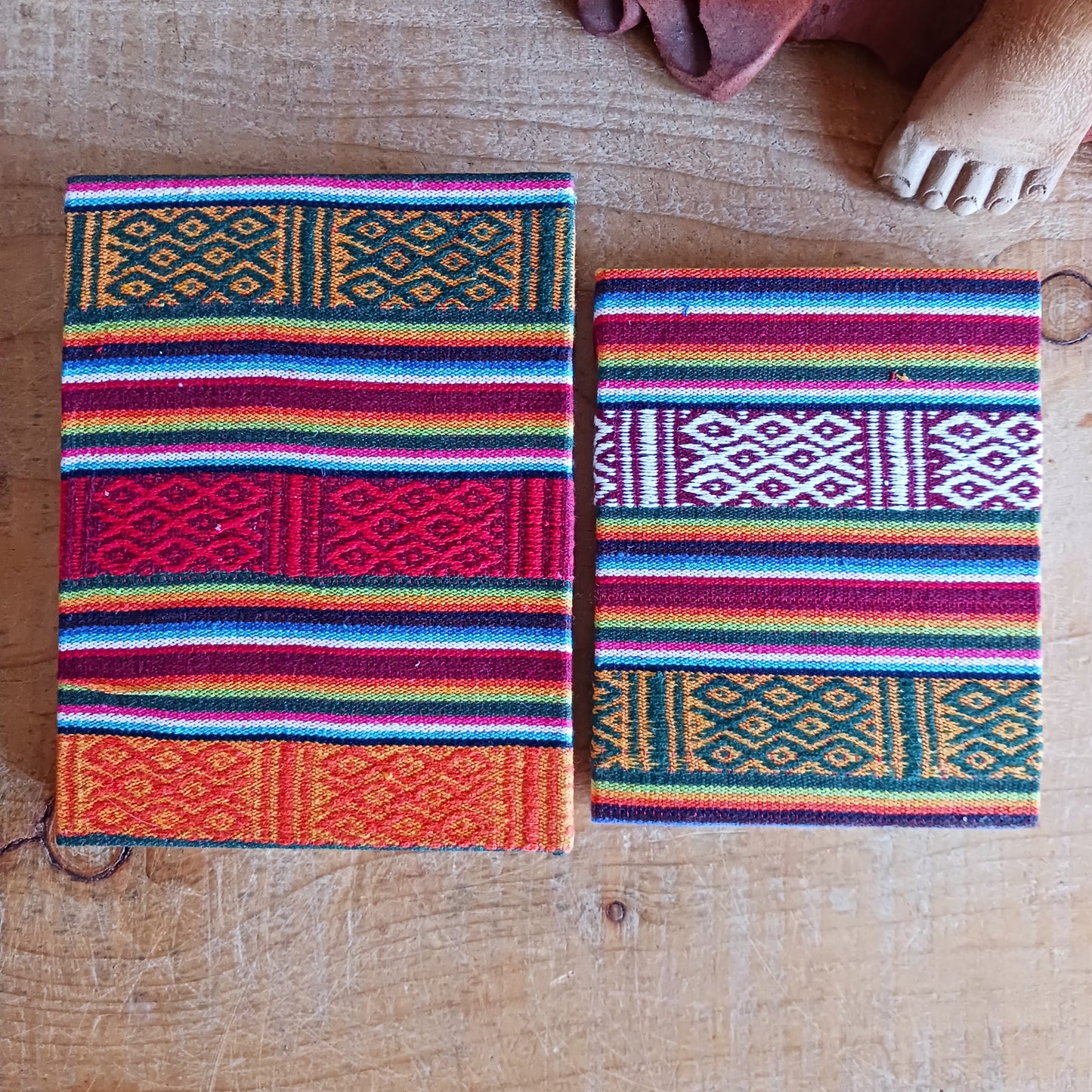 These beautifully handmade note books have a traditional Bhutani hard back cotton cover and pages inside made from Lokta paper. The "Lokta" paper is made of Daphne paper, hand made using a traditional method without involving any mechanical equipment, and no chemicals are used.