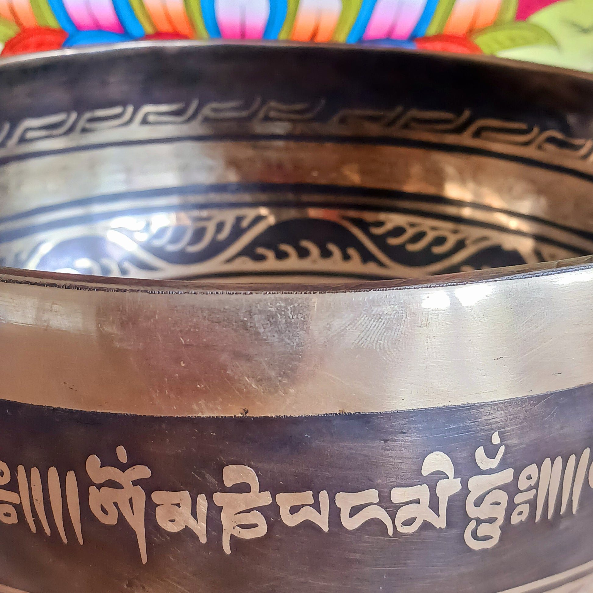This beautifully crafted Tibetan Singing Bowl is machine made and delicately etched with the sacred Om Mantra, symbolizing universal connection and inner peace. Each bowl is unique in its artistry and design. Traditionally used for meditation and healing, singing bowls help restore harmony between body, mind, and soul.
