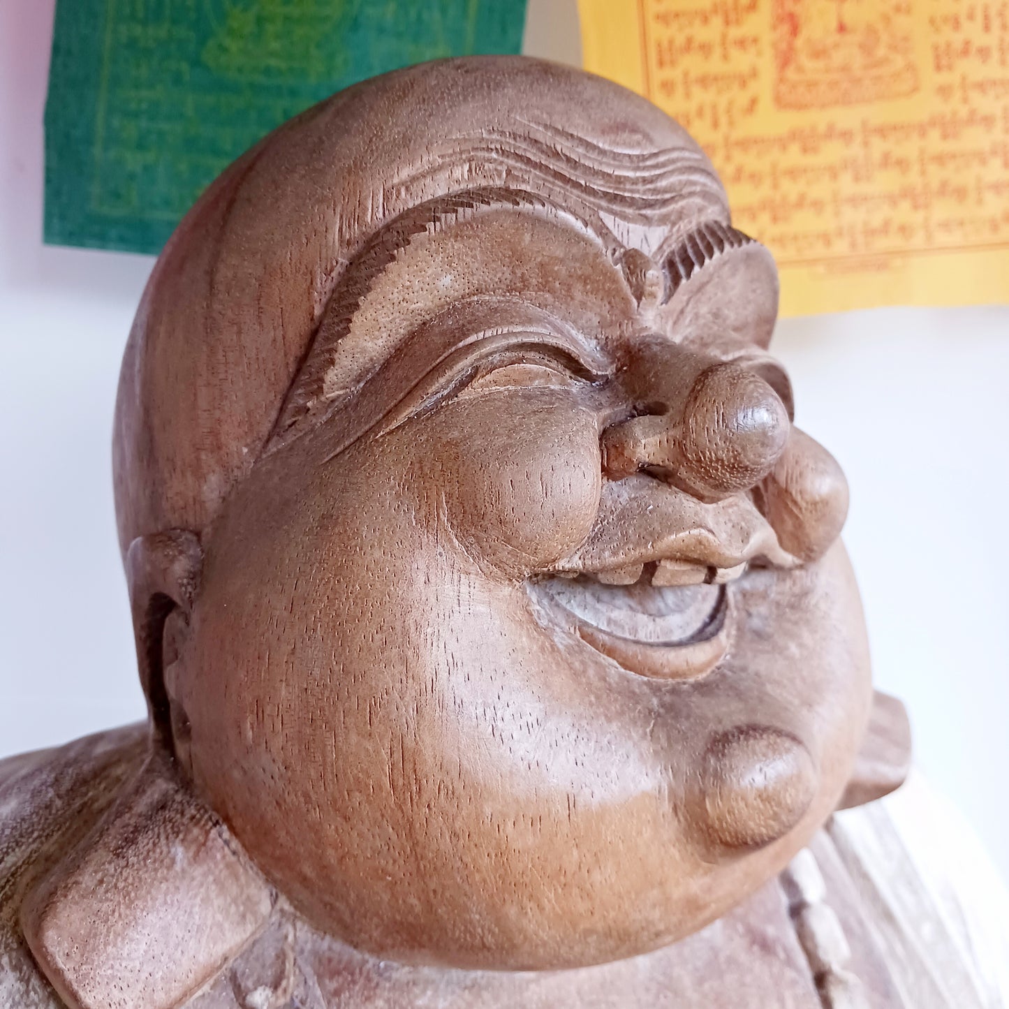 Bring warmth, joy, and calm into your space with this stunning Large Hand-Carved Happy Buddha Statue. Each piece is patiently sculpted by skilled artisans using traditional tools, a process that can take weeks and gives every curve and detail its distinctive character.