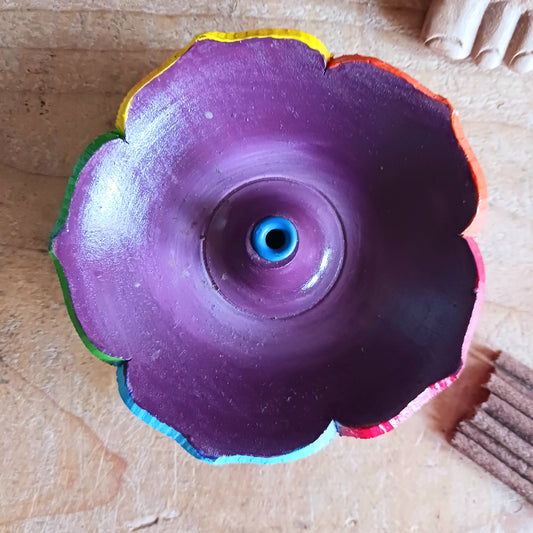 Add a touch of serenity and traditional Himalayan craftsmanship to your sacred space with this hand-painted Tibetan Incense Stick Holder. Carefully crafted in Nepal by skilled artisans, each wooden holder is decorated with a vibrant Seven Chakra lotus design, symbolizing balance, energy, and harmony.