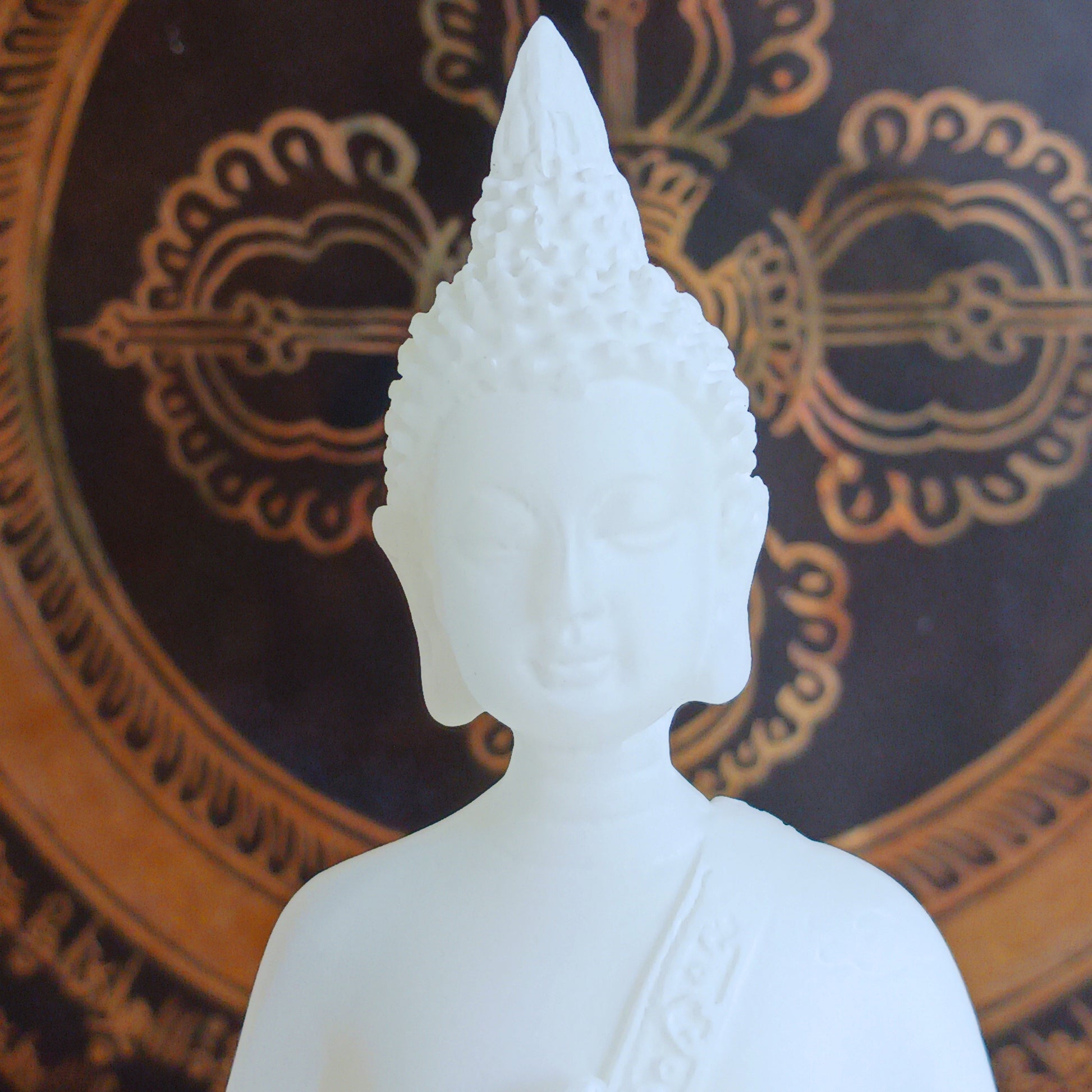 Bring serenity and spiritual symbolism into your sacred space with this beautifully crafted 16cm White Buddha Statue, complete with an Amrita vase. Handmade in Tibet, this statue reflects traditional Buddhist artistry and carries deep meaning rooted in ancient Sanskrit.