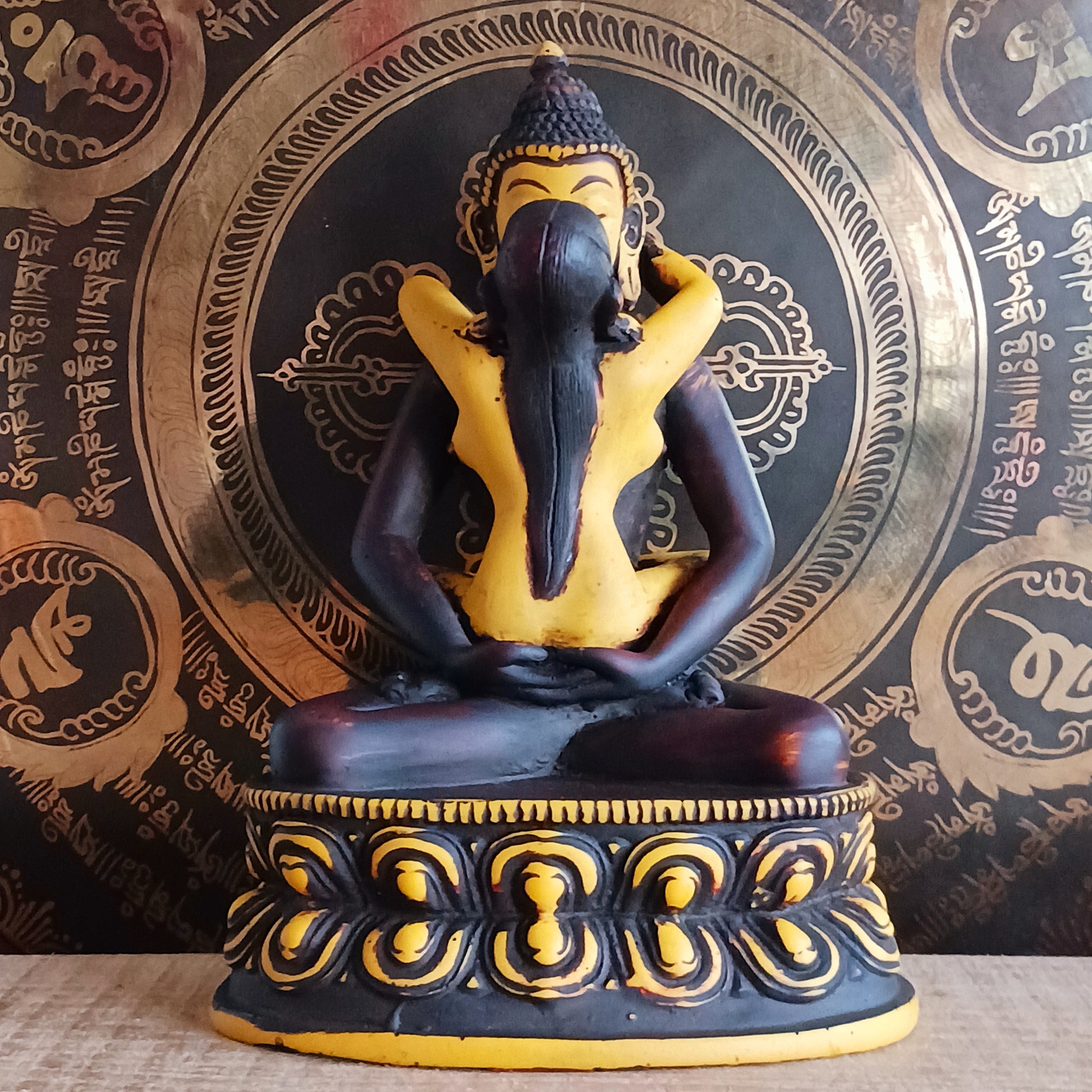 Discover a uniquely crafted Buddha and Shakti Embracing Statue, cast in high-quality resin and hand-painted in rich maroon and yellow tones. Sculpted by skilled Nepalese artisans, this extraordinary piece portrays the sacred union of Samantabhadra and his consort—a symbolic representation of harmony, balance, and the inseparable connection between wisdom and compassion.