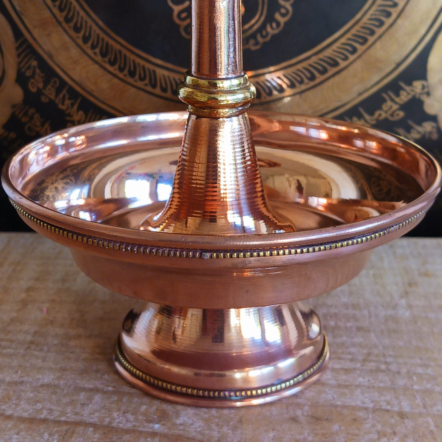 Immerse yourself in the sacred traditions of Tibetan Buddhism with this Traditional Tibetan Buddhist Copper Serkyem Set. Expertly crafted from high-quality copper, this ritual offering set is an essential tool used during pujas, deity offerings, and ceremonial practices.