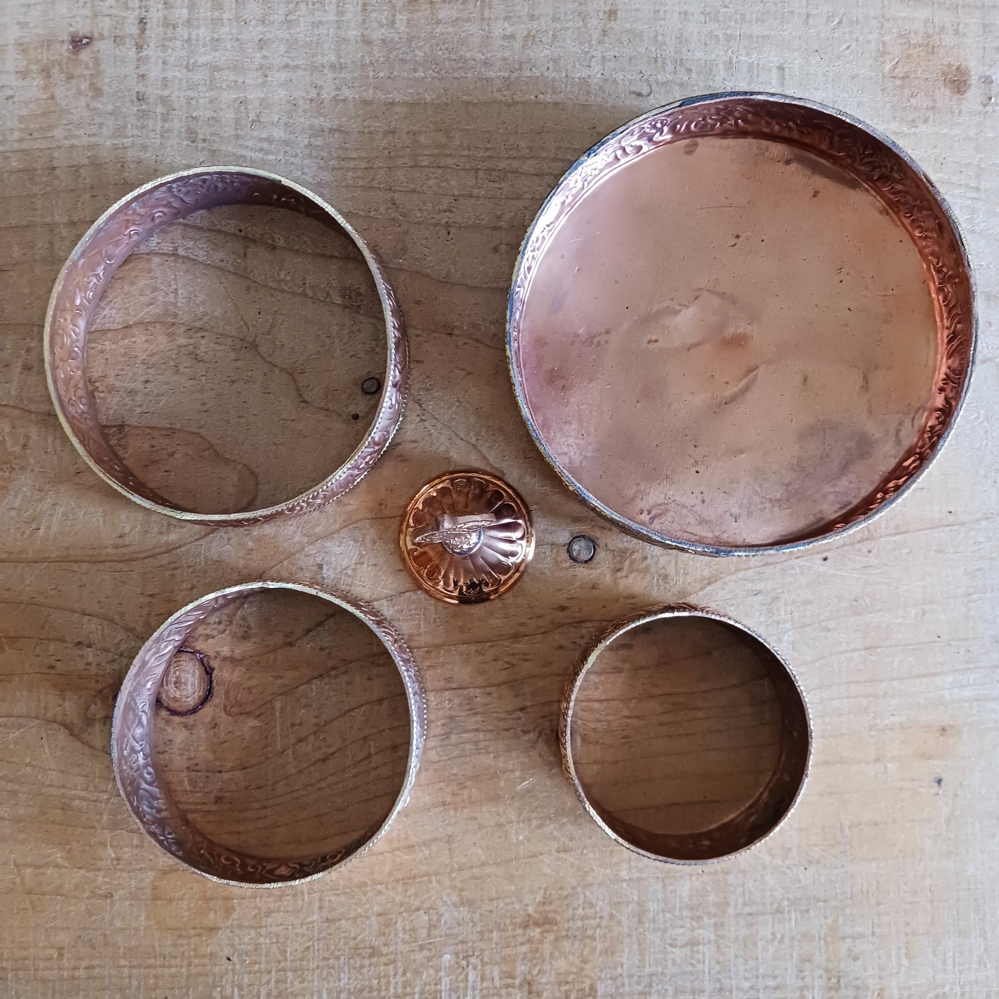 Elevate your spiritual practice with this handmade large copper mandala offering set, crafted with traditional Tibetan artistry. In Tibetan Buddhism, offering a mandala symbolizes offering the entire universe—mountains, continents, precious substances, and realms—to the enlightened beings. Through this profound practice, one accumulates merit, wisdom, and spiritual clarity.