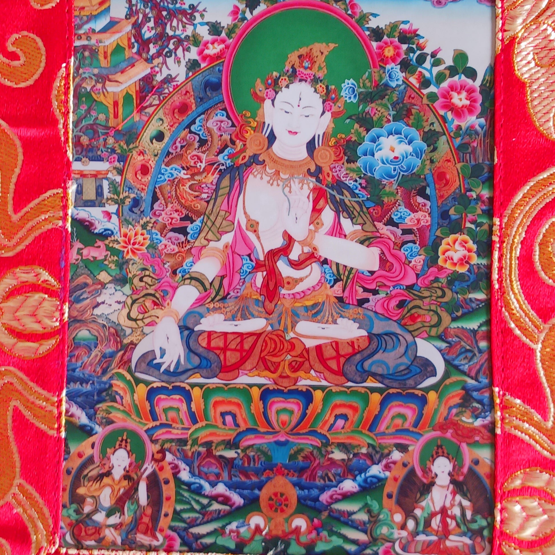 Beautiful small thangka of White Tara with silk brocade. Symbol of purity, compassion & longevity. Ideal for meditation, altar, or spiritual décor.