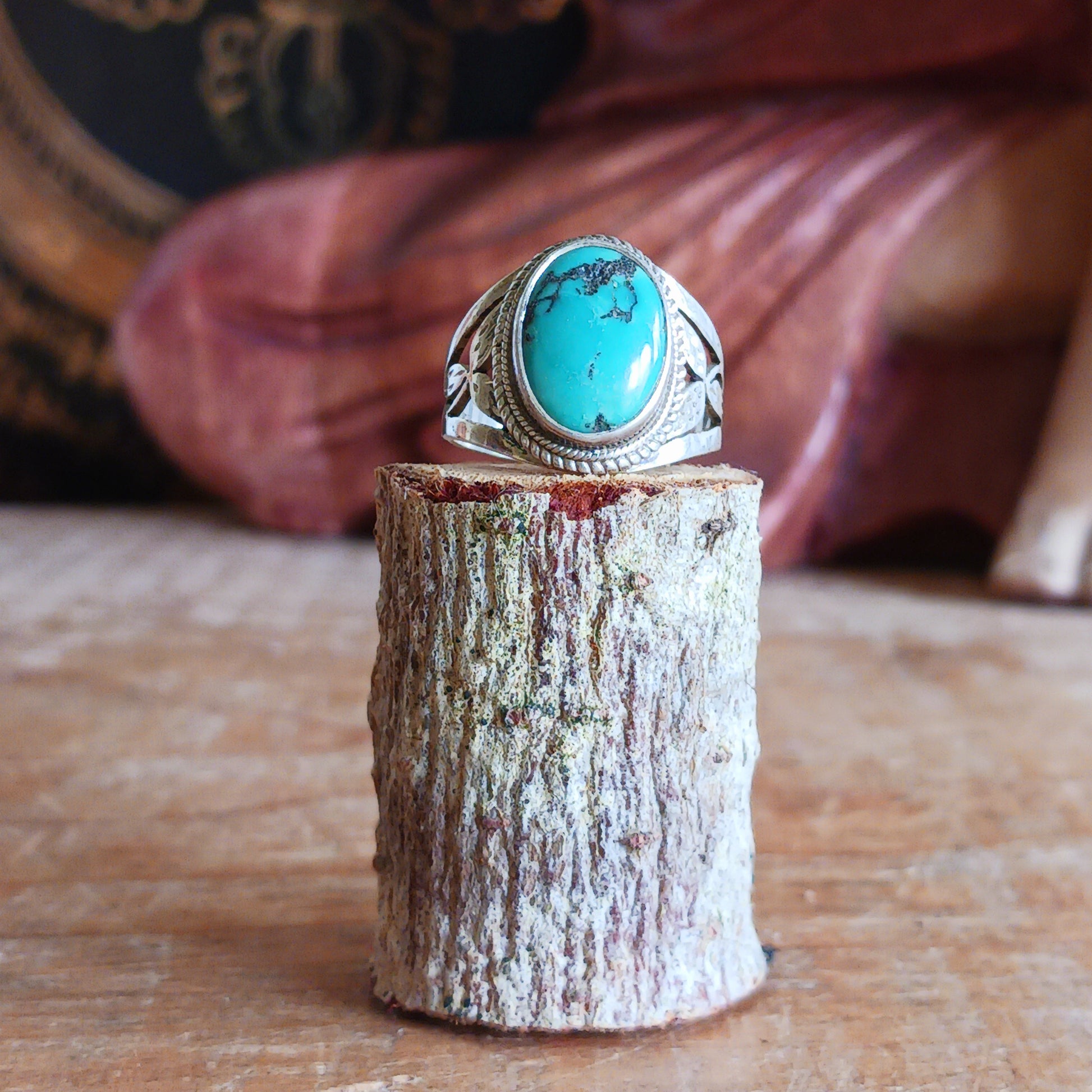 This beautiful decorative Tibetan turquoise ring is carefully handcrafted with genuine Sterling Silver 925, featuring an intricate surround design that highlights the natural beauty of the stone.