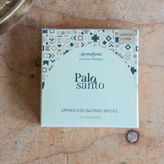 Aromafume Palo Santo Incense Bricks are a natural, non-toxic incense designed for use with a compatible incense diffuser. Infused with the sacred aroma of palo santo, known as “holy wood,” this incense releases a warm, woody fragrance with soft citrus undertones when gently heated.