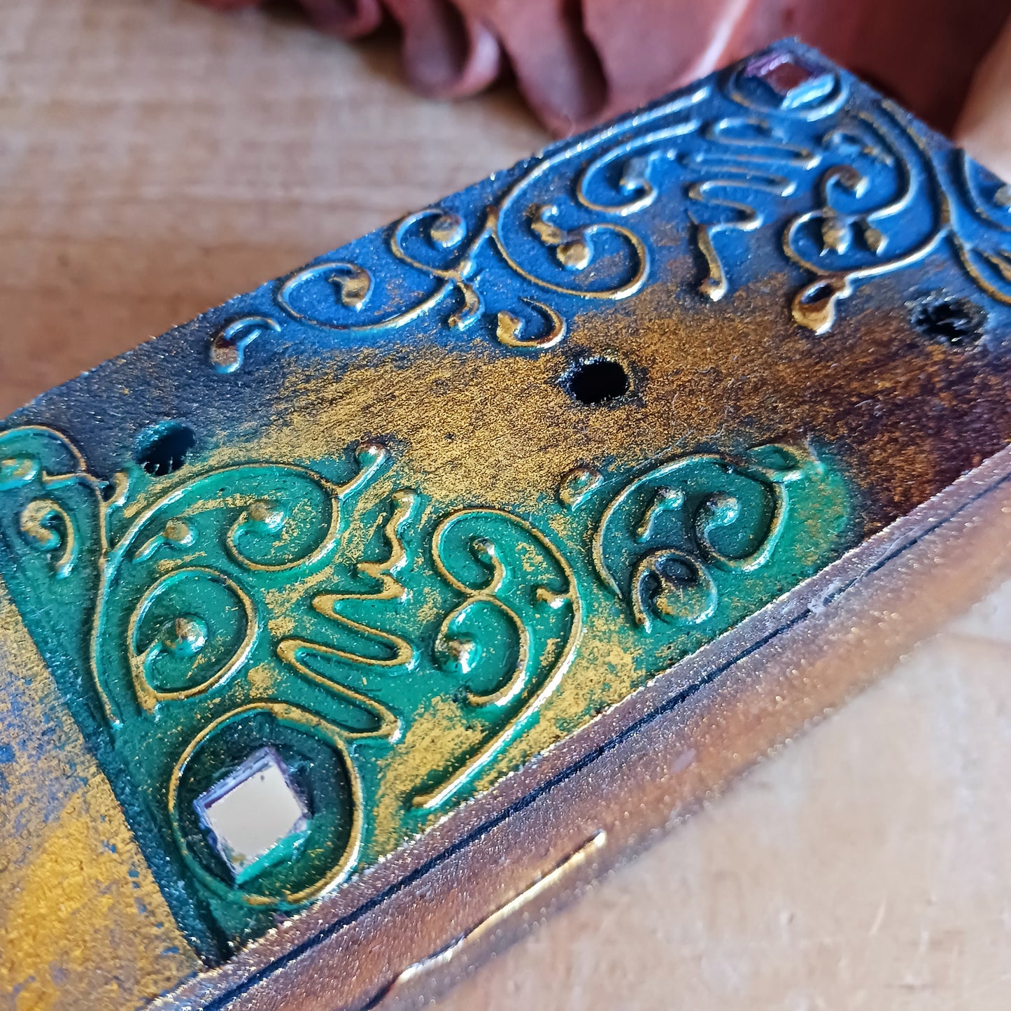 Create a calm, aromatic atmosphere in your home with this beautifully handcrafted OM incense holder. Made from responsibly sourced wood, this unique piece features a delicately hand-carved OM symbol, making it both a functional incense burner and a decorative spiritual accent.