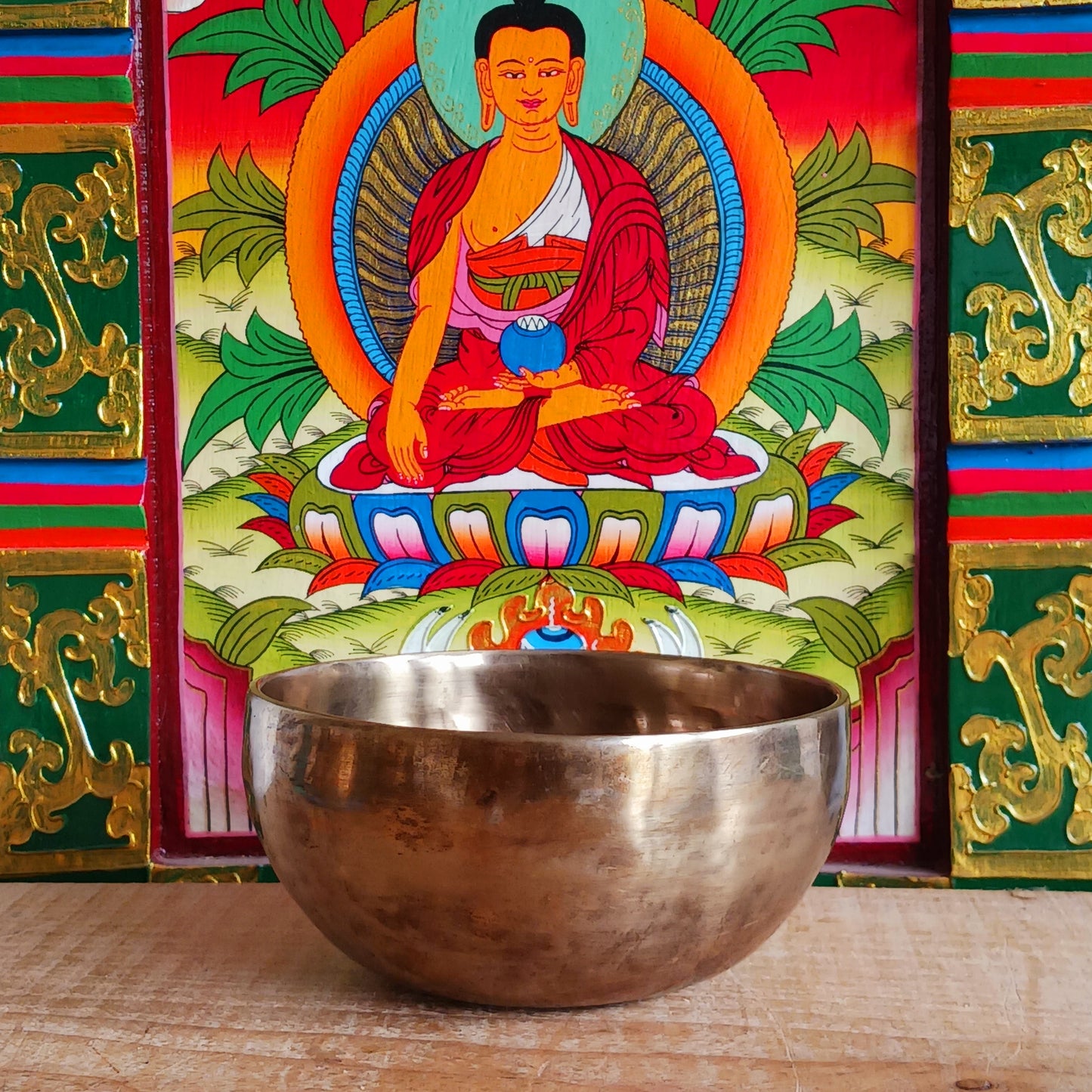 Elevate your spiritual practice with this unique, hand-beaten singing bowl, featuring a stunning Green Tara engraving inside the bowl. Known as the goddess of compassion and action, Green Tara is a powerful symbol in Tibetan Buddhism, bringing calm, protection, and clarity to your space. This bowl produces rich, resonant tones perfect for meditation, sound healing, or sacred decor.
