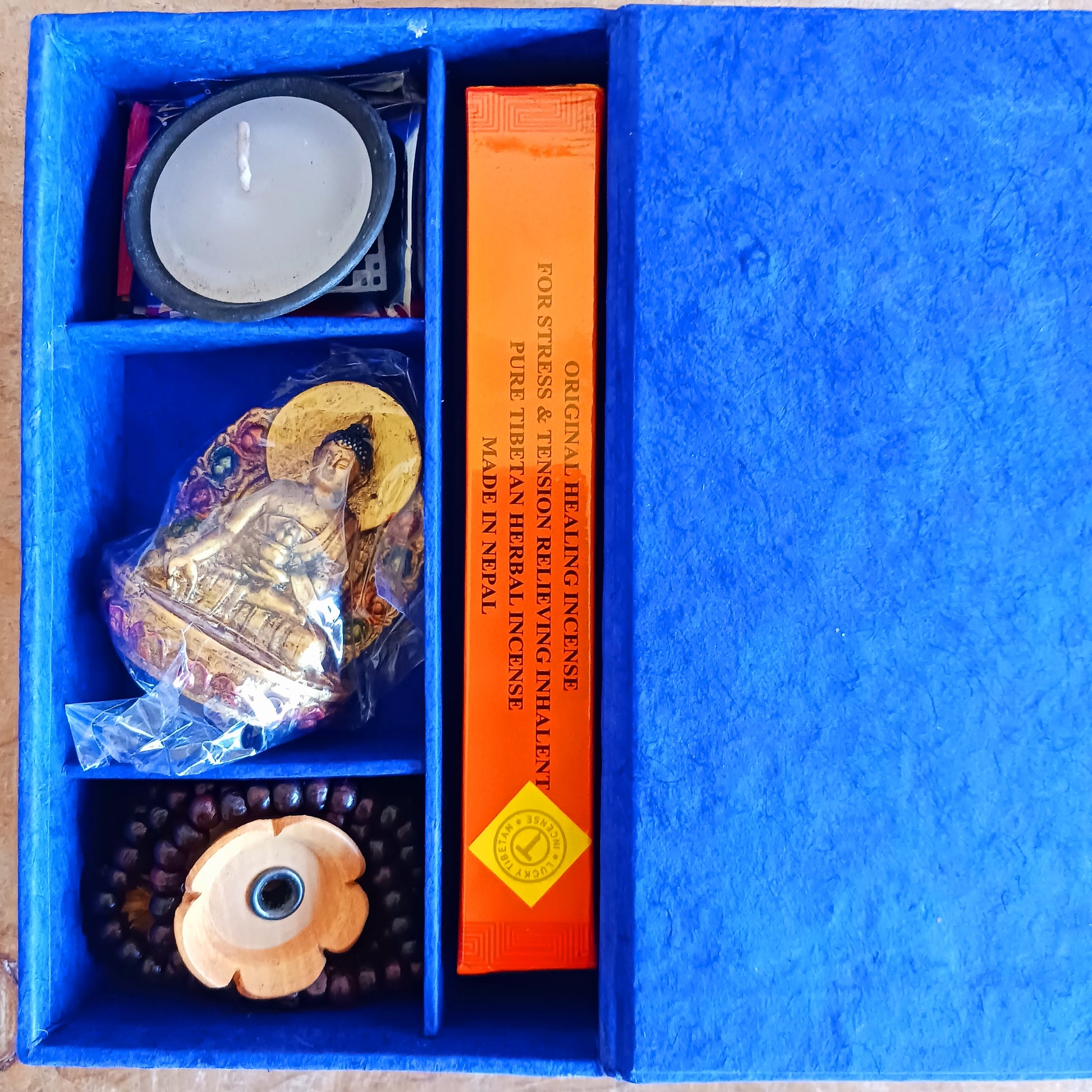 Elevate your meditation and Puja practice wherever your journey takes you. This Handmade Nepalese Buddhist Travelling Altar Set provides a complete, compact sacred space for spiritual grounding on the road or away from home.