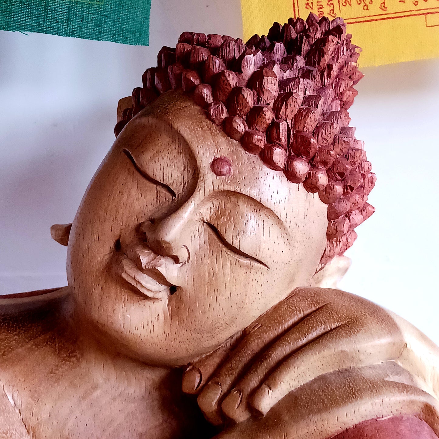 Bring a sense of deep calm and mindful beauty into your space with this hand-carved Resting Buddha statue, crafted from sustainably sourced Suar wood (Albizia Saman). This fast-growing, abundant wood species allows for responsible cultivation while offering rich grain and lasting durability.