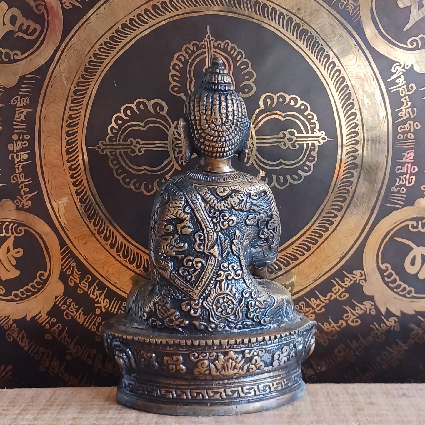 Elevate your spiritual space with this exquisite Akshobya Buddha statue, expertly cast in heavy brass and engraved with intricate detail. Representing one of the five Dhyani Buddhas, Akshobya is visualized in blue and associated with the heart chakra, symbolizing the transformation of anger and sadness into love and compassion.