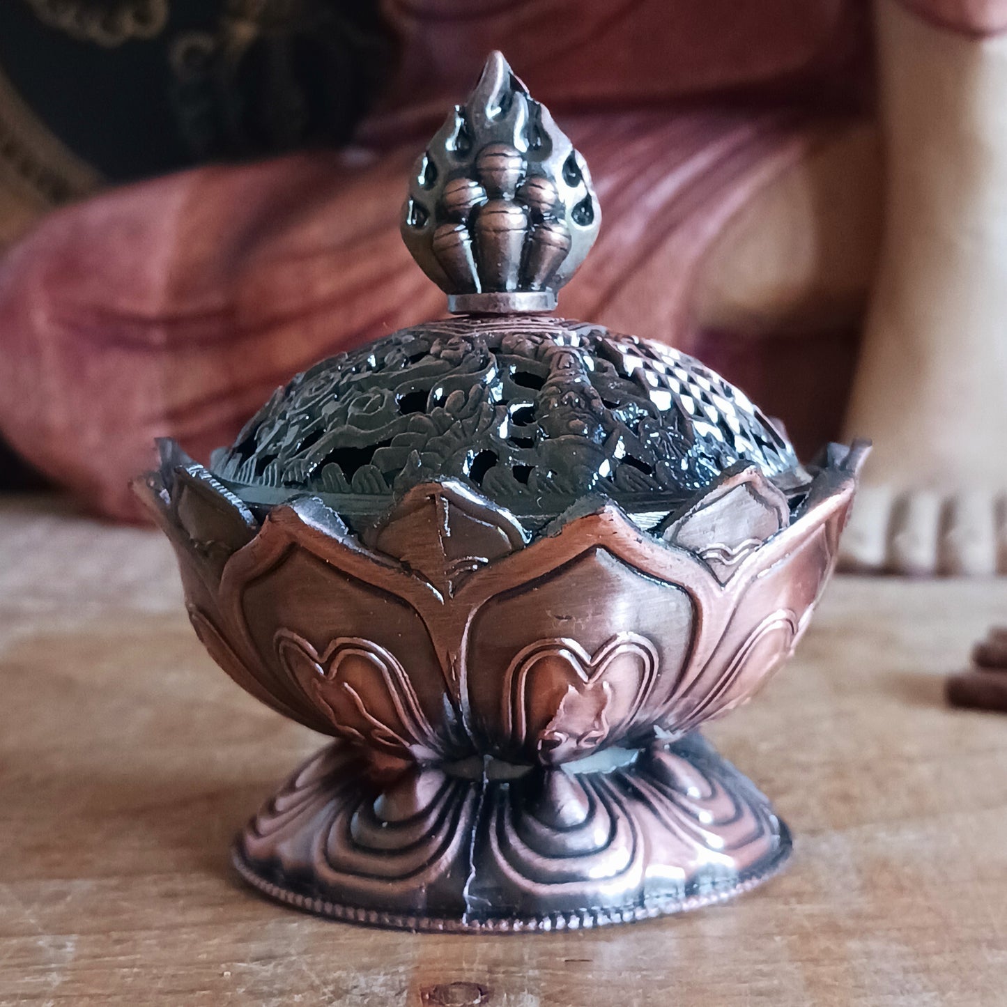 Invite calm and beauty into your sacred space with our Elegant Lotus Incense Burner. Thoughtfully shaped like a blooming lotus—the symbol of purity and spiritual awakening—this burner features a removable cap adorned with traditional Tibetan Auspicious Symbols, calling in harmony, luck, and protection with every use.