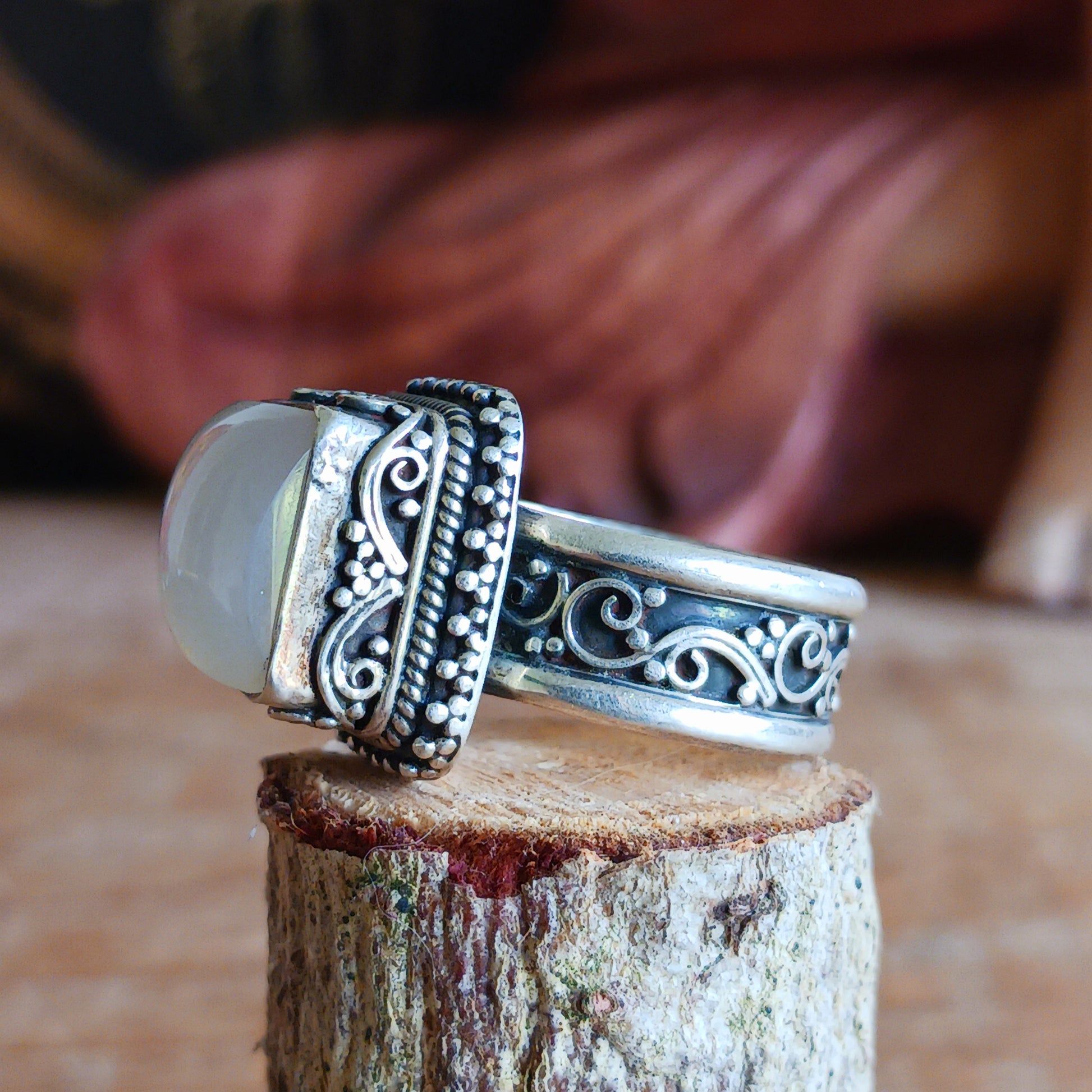 Embrace the beauty and meaning of this exquisite Tibetan Moonstone Ring, expertly handcrafted in 925 sterling silver with an intricate surround design. Each ring showcases the natural glow of moonstone, a gemstone celebrated for its calming energy and timeless elegance.