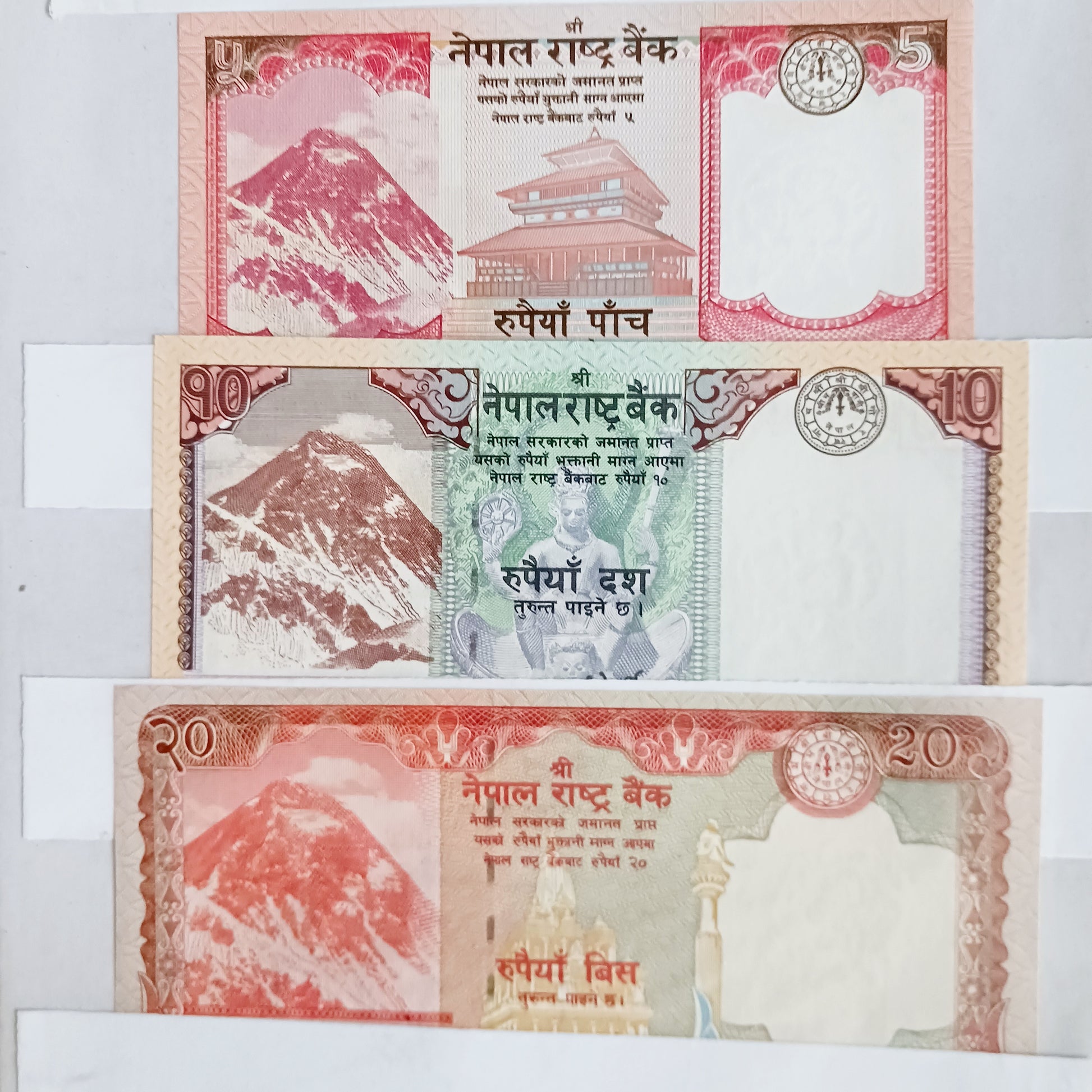 Discover the beauty and cultural significance of Nepal with this Nepali Republic Paper Money Currency Collection, featuring authentic 5, 10, and 20 Nepalese Rupee collectable banknotes.