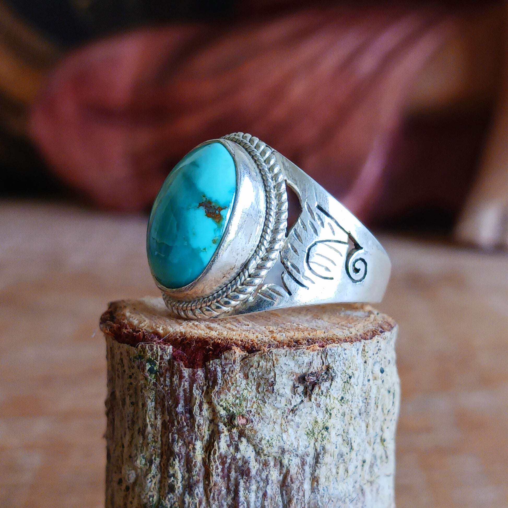 This beautiful decorative Tibetan turquoise ring is carefully handcrafted with genuine Sterling Silver 925, featuring an intricate surround design that highlights the natural beauty of the stone.