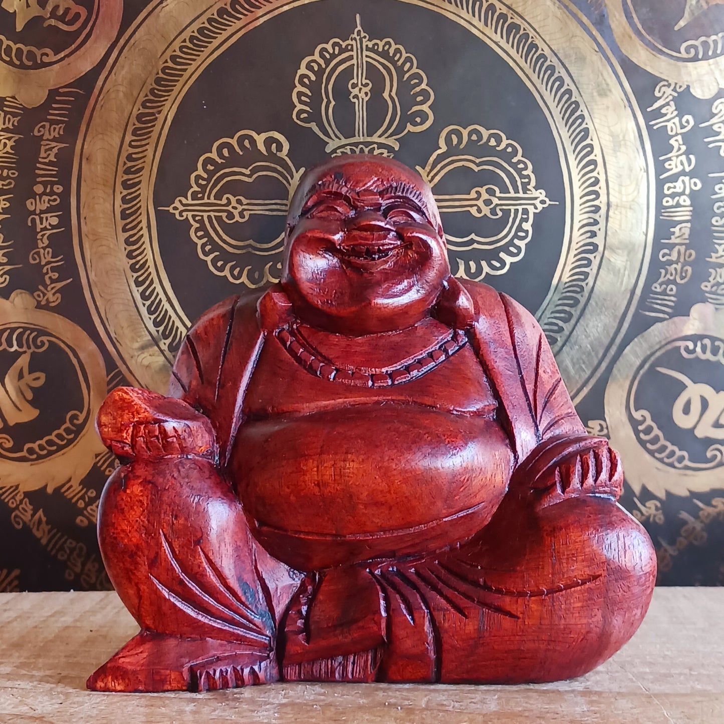 Bring joy and good fortune into your space with this exquisite hand-carved Laughing Buddha statue. Known as Budai in Chinese culture, this beloved figure represents contentment, abundance, and spiritual well-being.