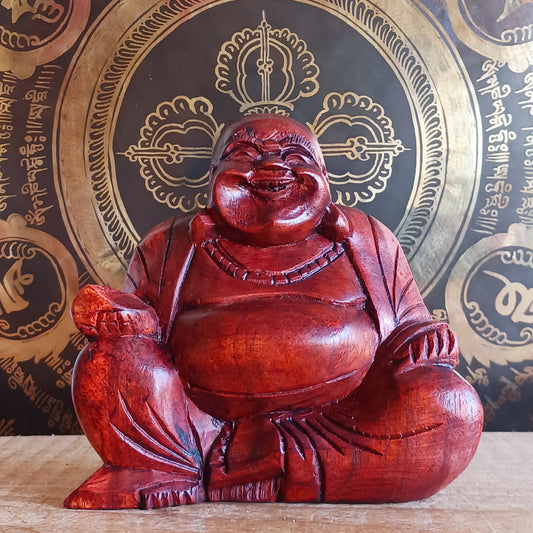 Bring joy and good fortune into your space with this exquisite hand-carved Laughing Buddha statue. Known as Budai in Chinese culture, this beloved figure represents contentment, abundance, and spiritual well-being.